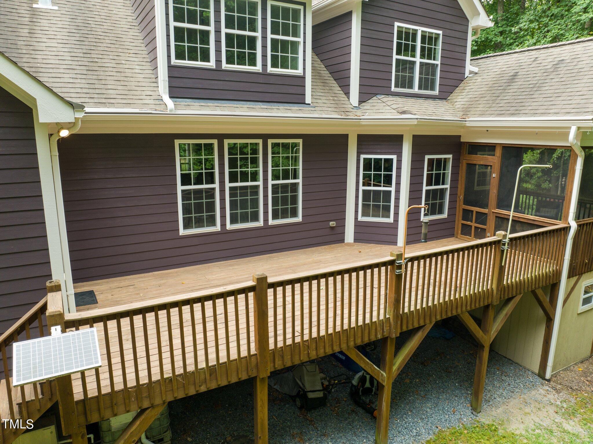 152 Roads End Pittsboro, NC 27312 - Photo 36 of 58 a view of a house with a window and wooden fence