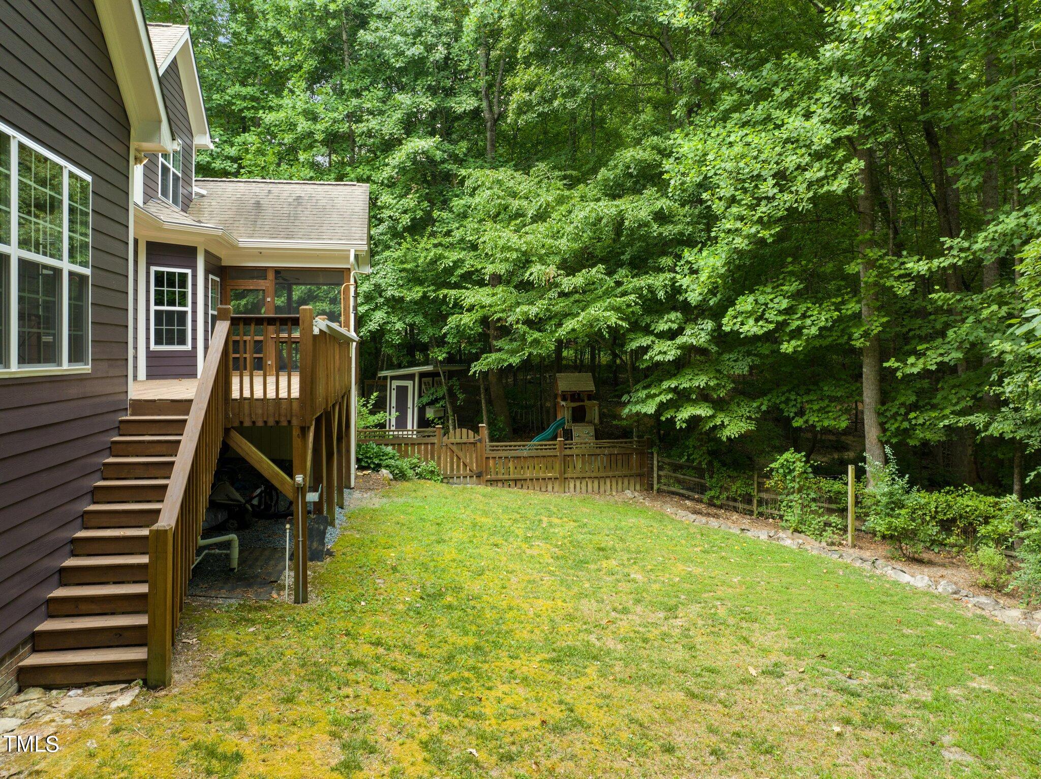 152 Roads End Pittsboro, NC 27312 - Photo 40 of 58 a view of house with a backyard porch and furniture
