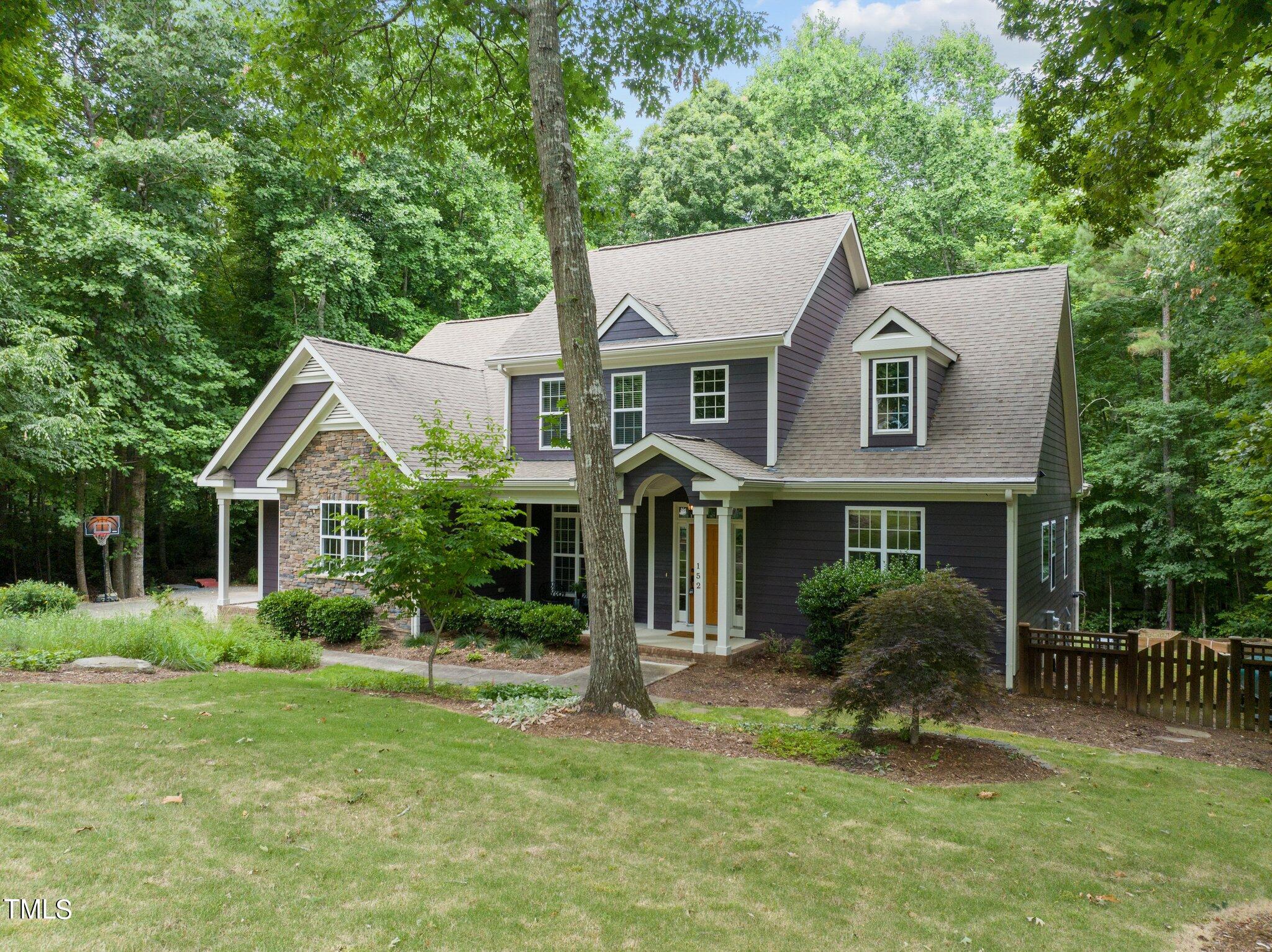 152 Roads End Pittsboro, NC 27312 - Photo 4 of 58 a aerial view of a house next to a yard