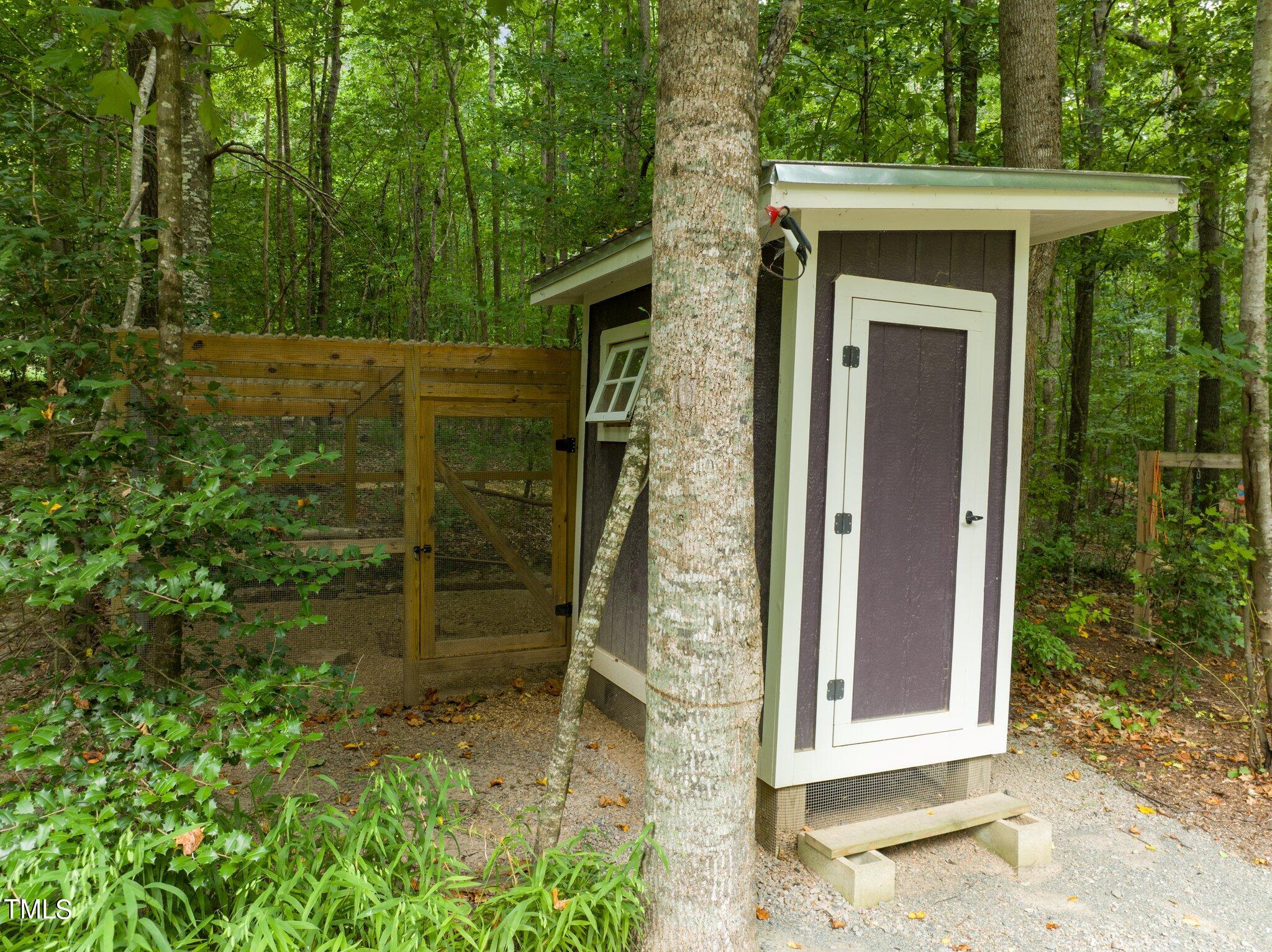 152 Roads End Pittsboro, NC 27312 - Photo 48 of 58 front view of a house with a yard
