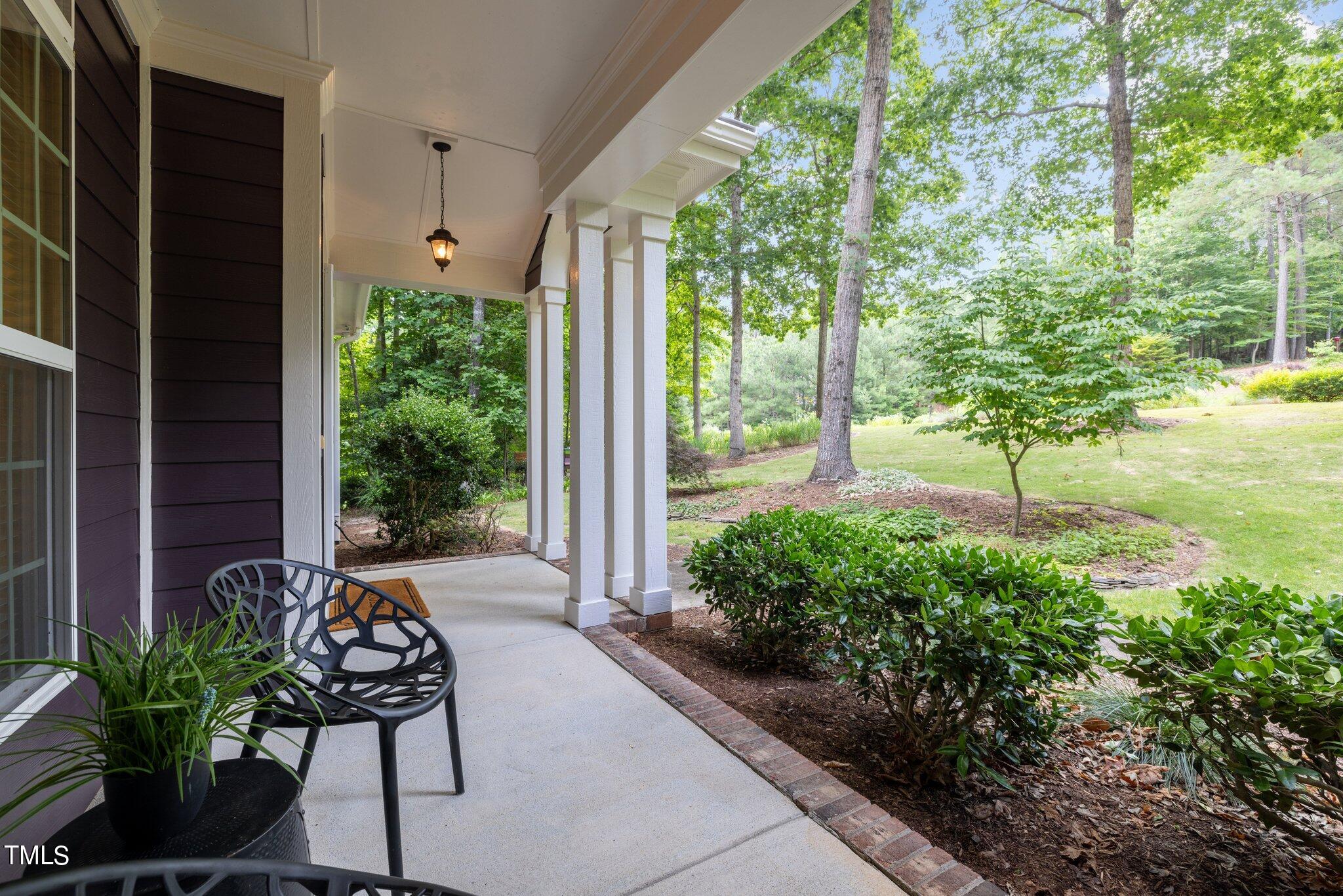 152 Roads End Pittsboro, NC 27312 - Photo 52 of 58 a house with garden in front of it