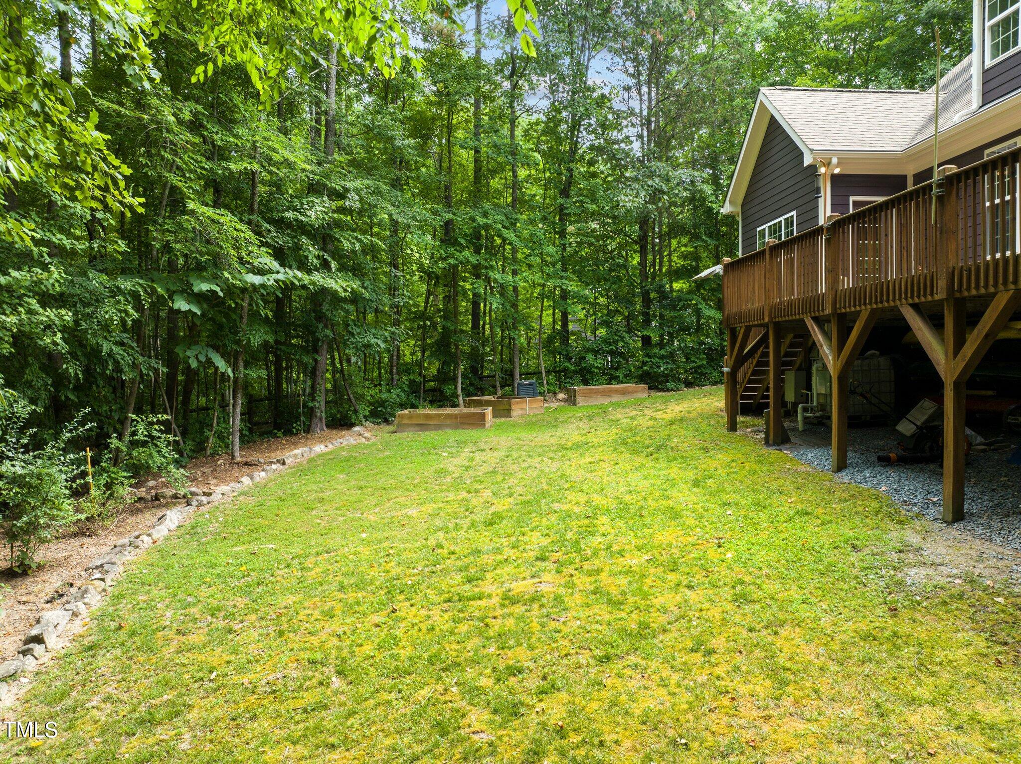 152 Roads End Pittsboro, NC 27312 - Photo 53 of 58 a view of a house with backyard and sitting area