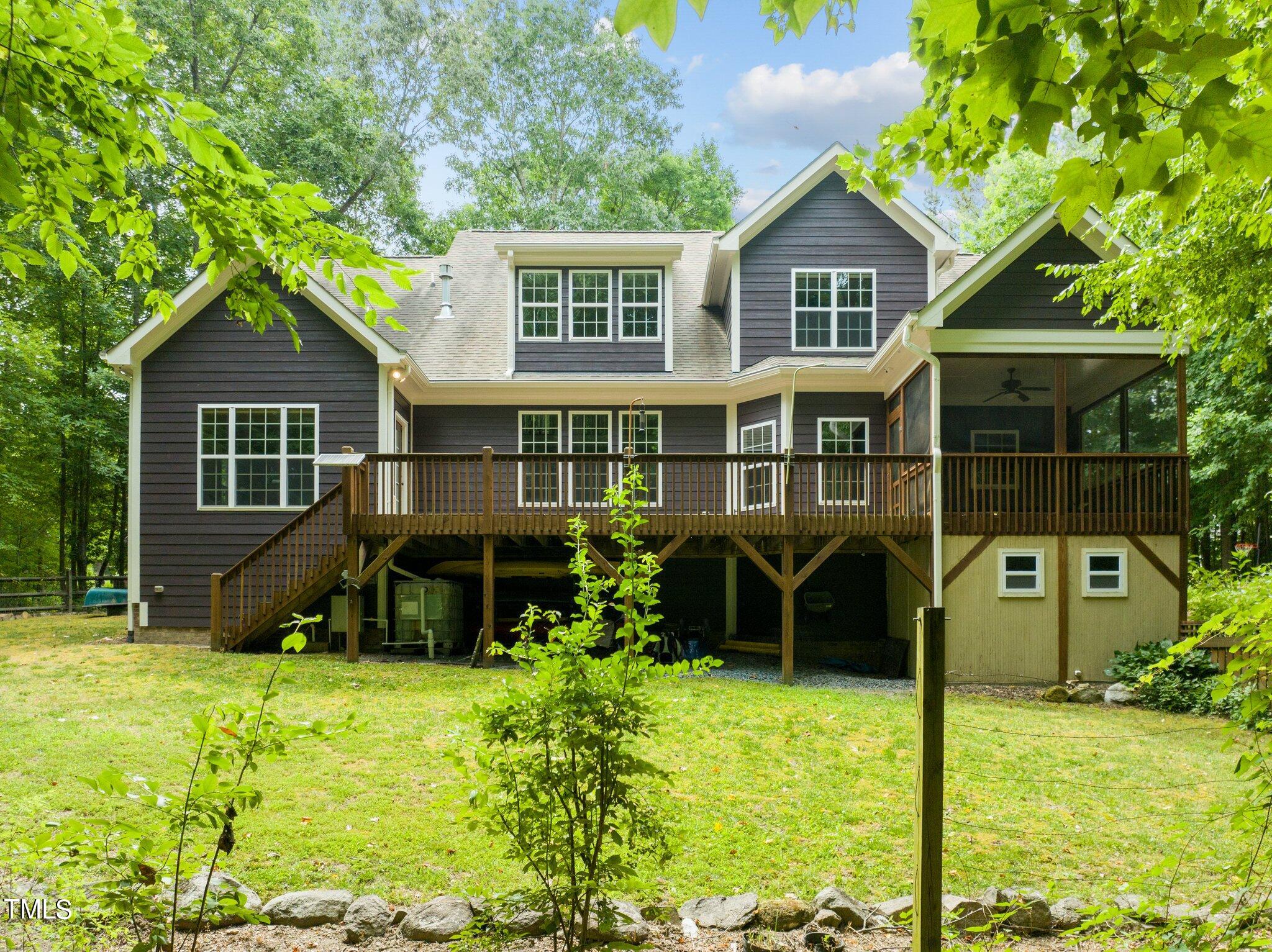 152 Roads End Pittsboro, NC 27312 - Photo 54 of 58 a view of a house with a yard and sitting area
