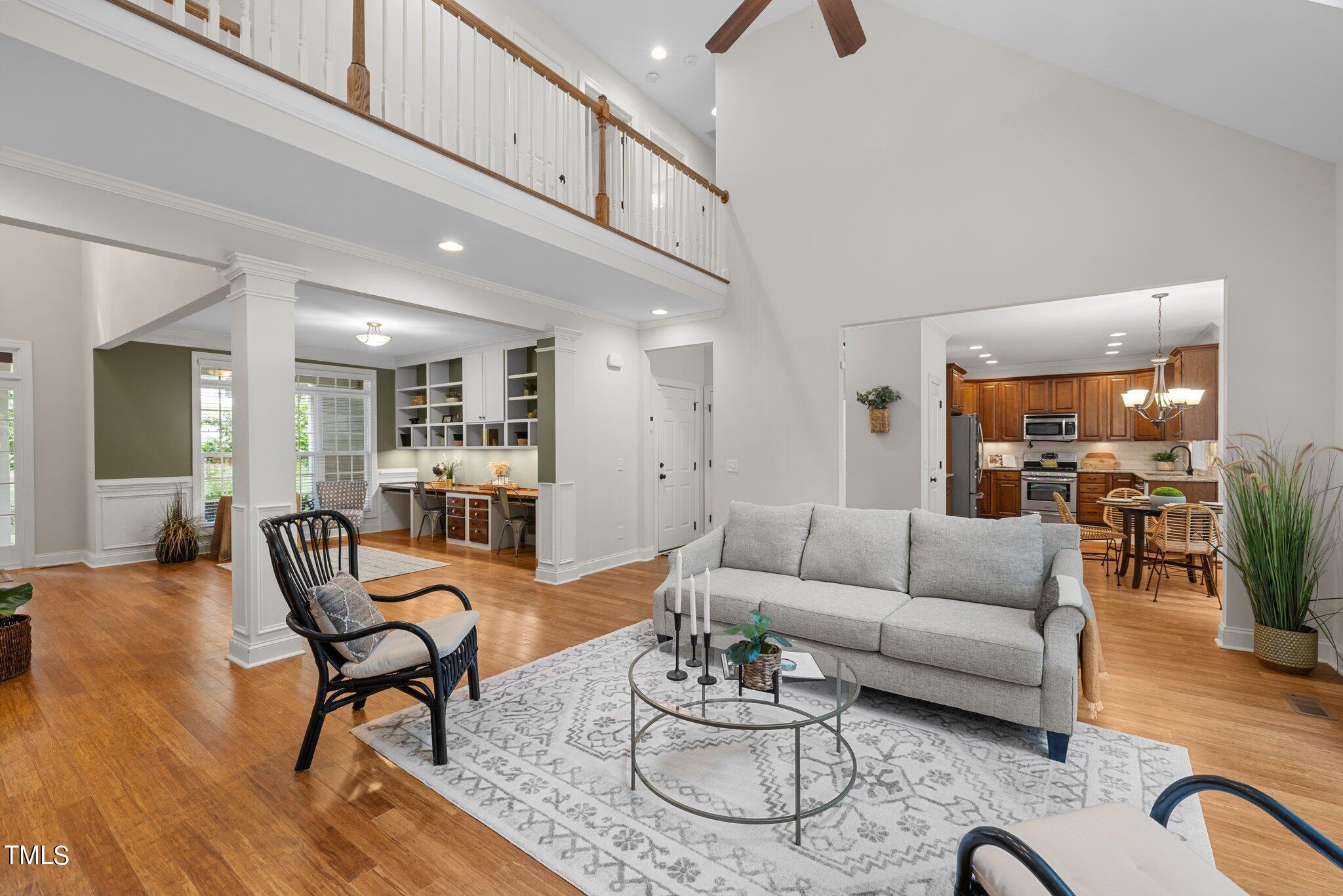 152 Roads End Pittsboro, NC 27312 - Photo 6 of 58 a living room with furniture and wooden floor