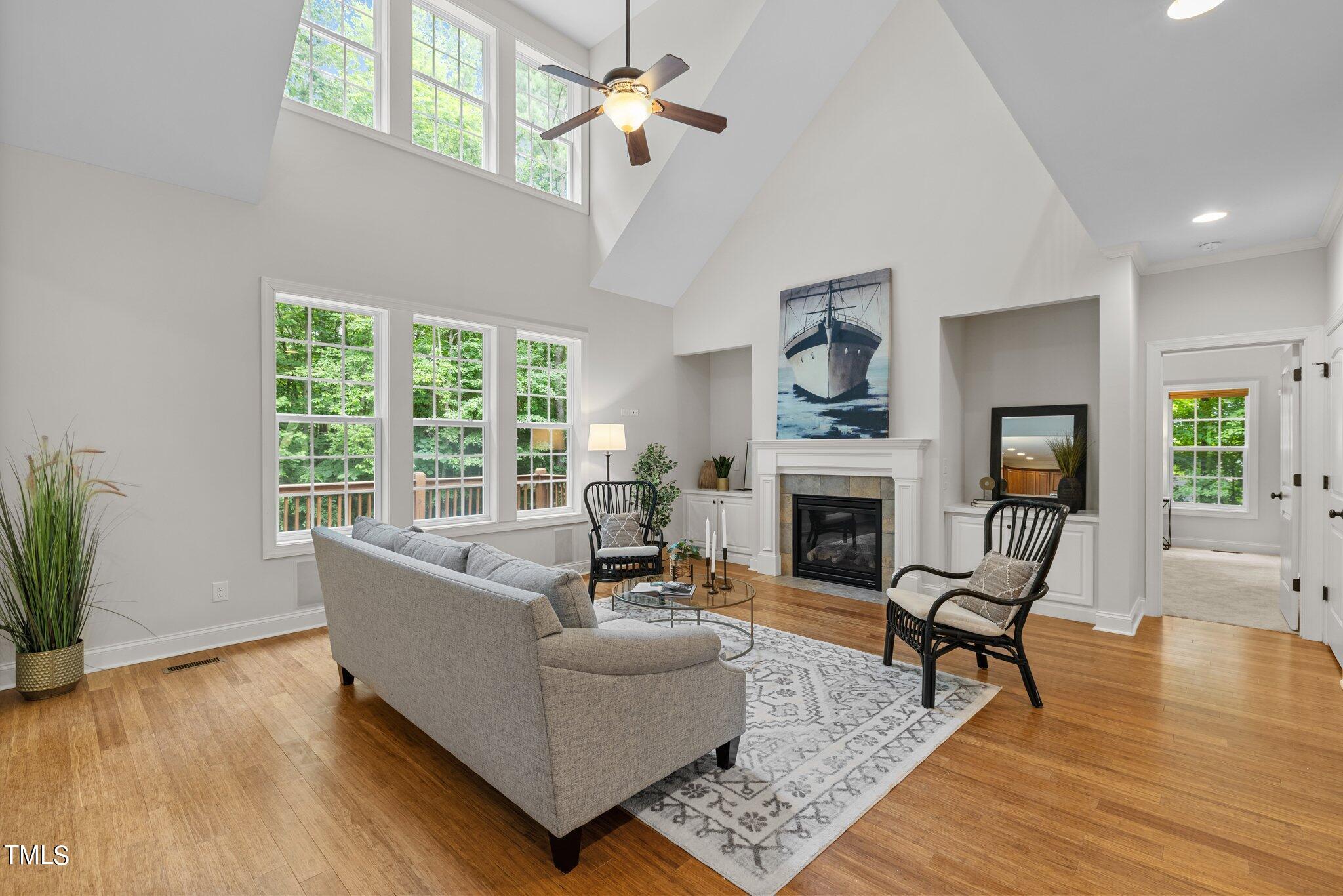 152 Roads End Pittsboro, NC 27312 - Photo 7 of 58 a living room with furniture fireplace and window