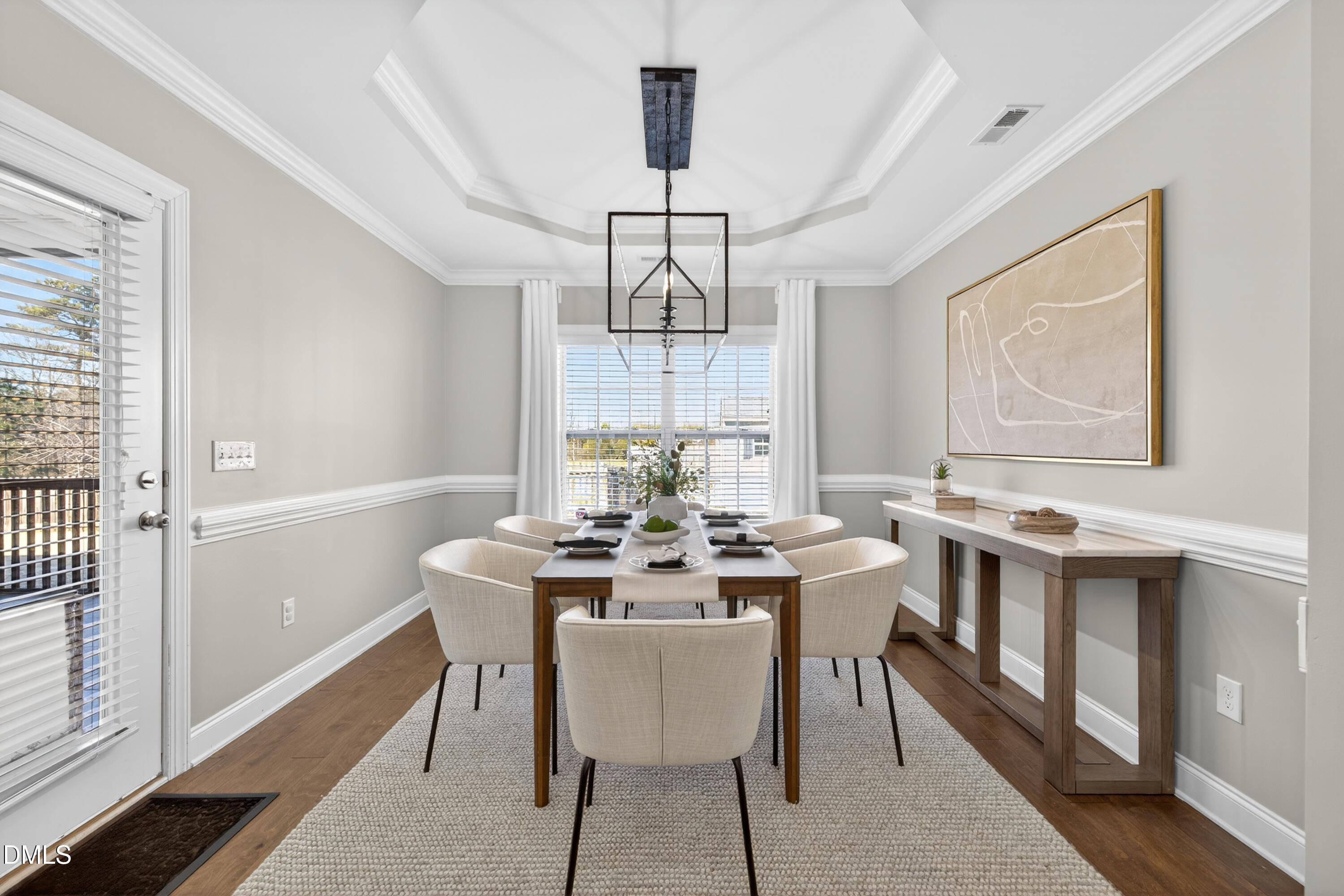5248 Copain Cove Fuquay-Varina, NC 27526 - Photo 14 of 47 a view of a dining room with furniture window and wooden floor