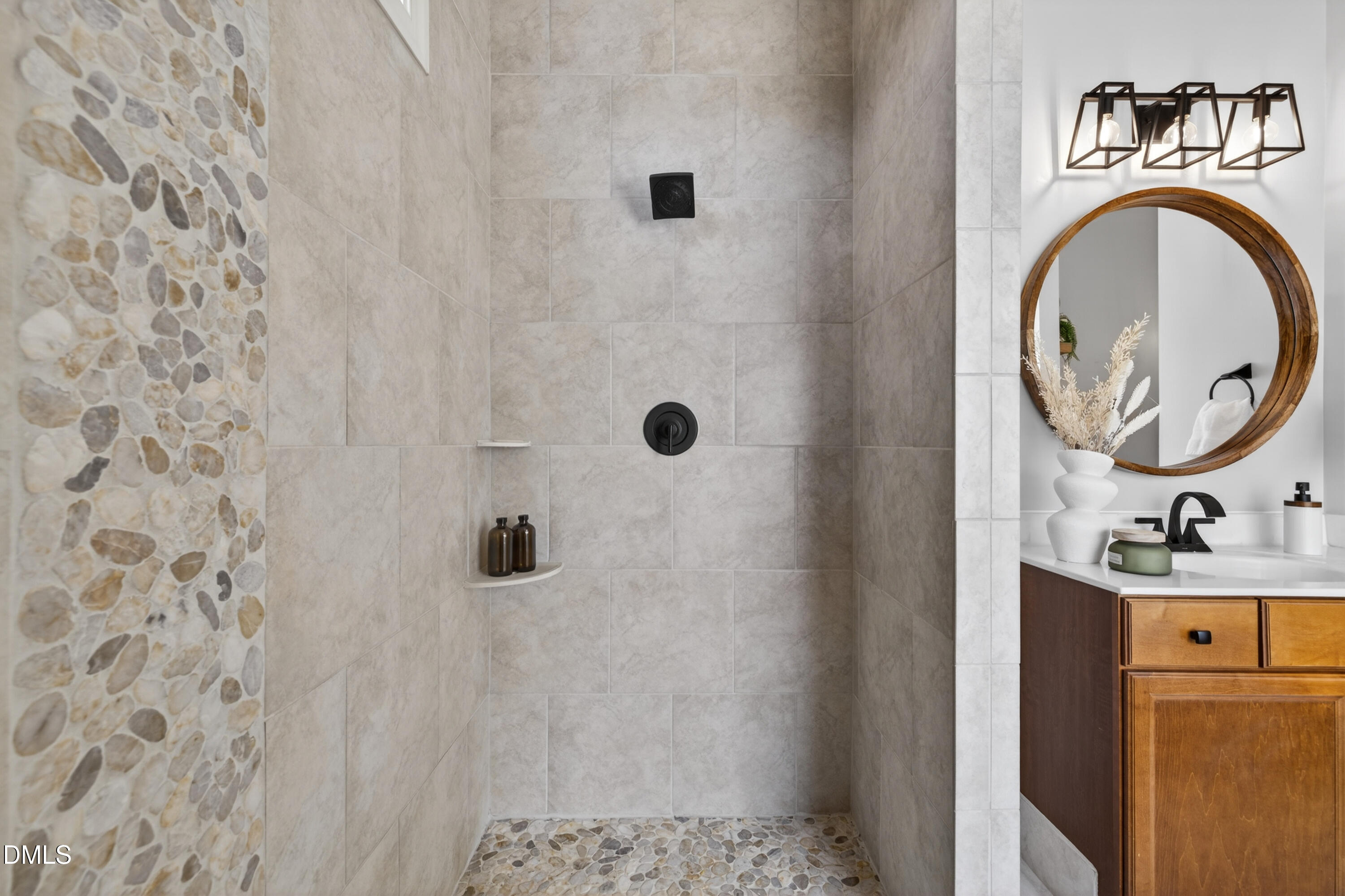 5248 Copain Cove Fuquay-Varina, NC 27526 - Photo 21 of 47 a bathroom with a sink a toilet and a mirror