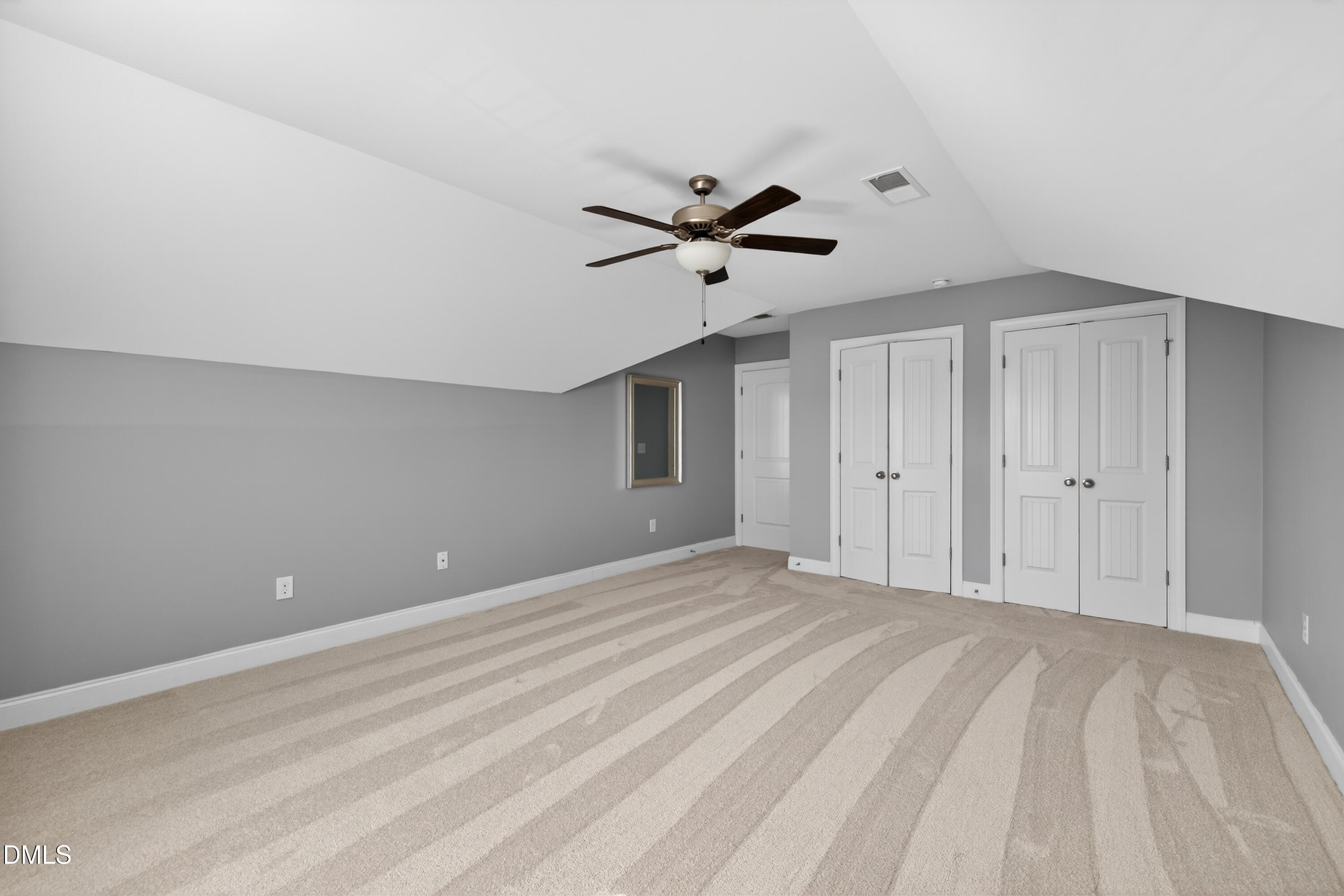 5248 Copain Cove Fuquay-Varina, NC 27526 - Photo 26 of 47 a view of a room with a ceiling fan
