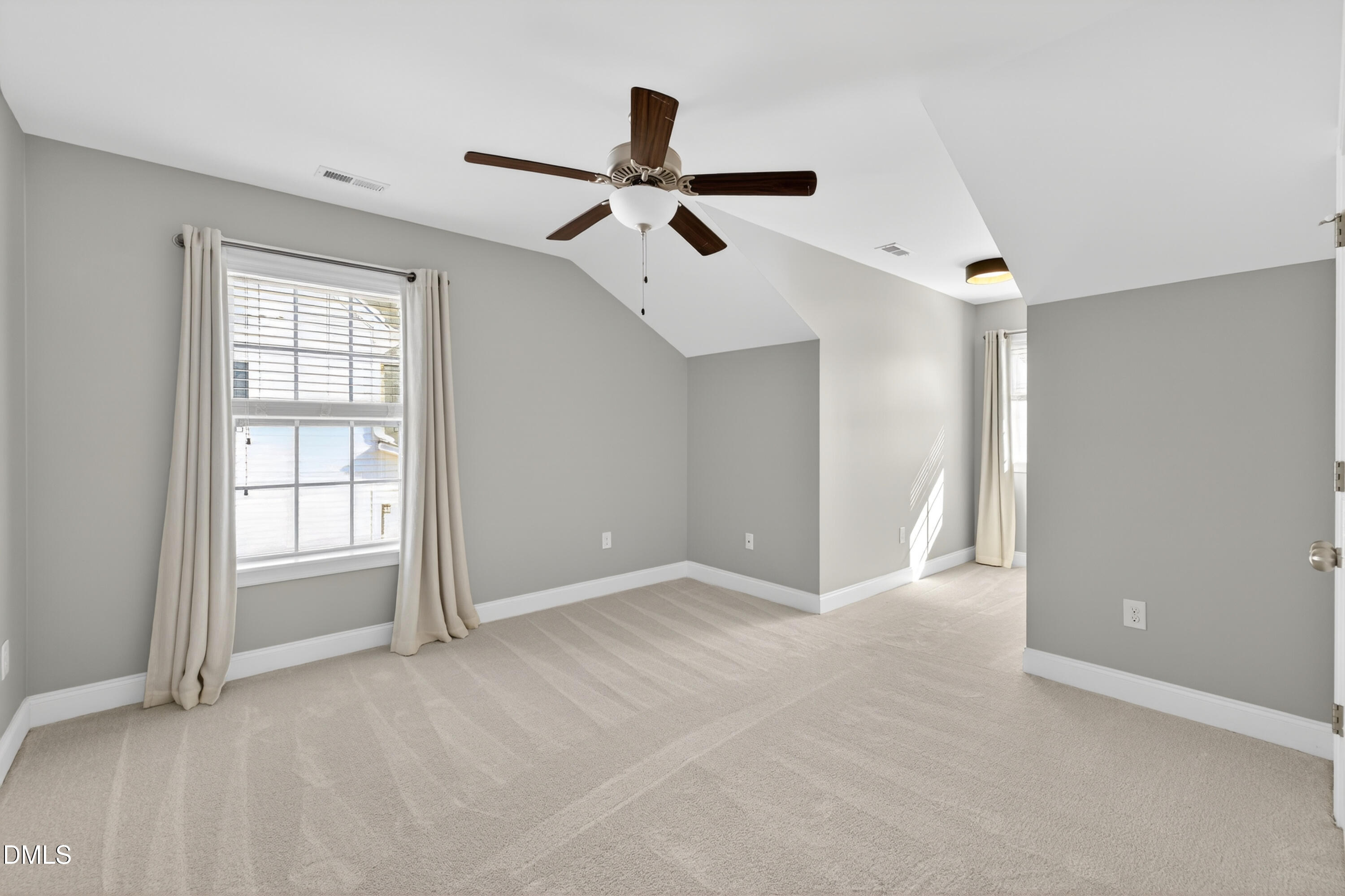 5248 Copain Cove Fuquay-Varina, NC 27526 - Photo 28 of 47 a view of an empty room with a window