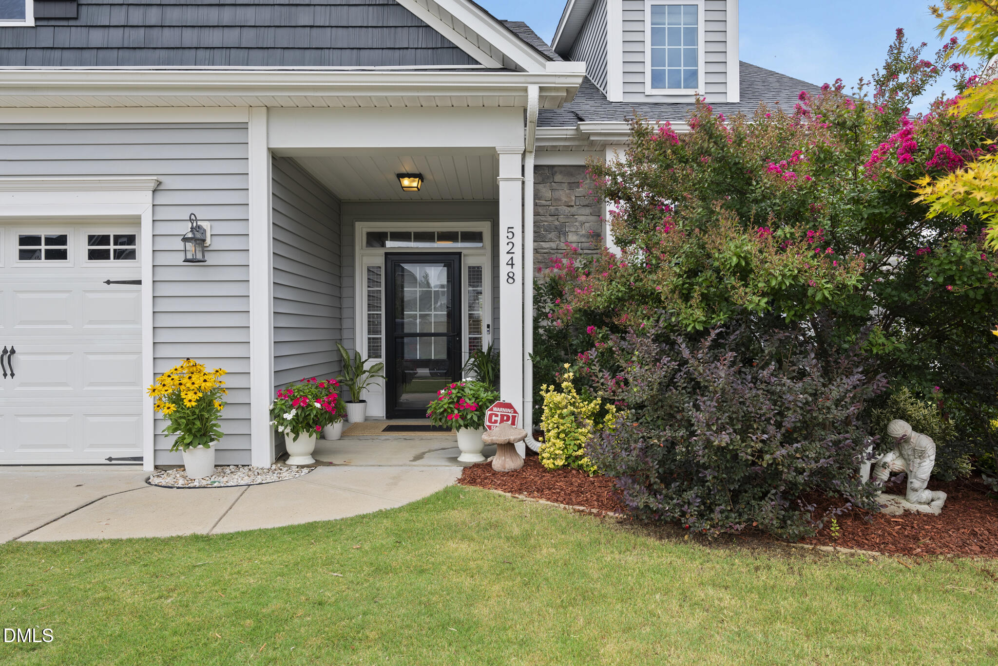 5248 Copain Cove Fuquay-Varina, NC 27526 - Photo 36 of 47 a front view of a house with a yard