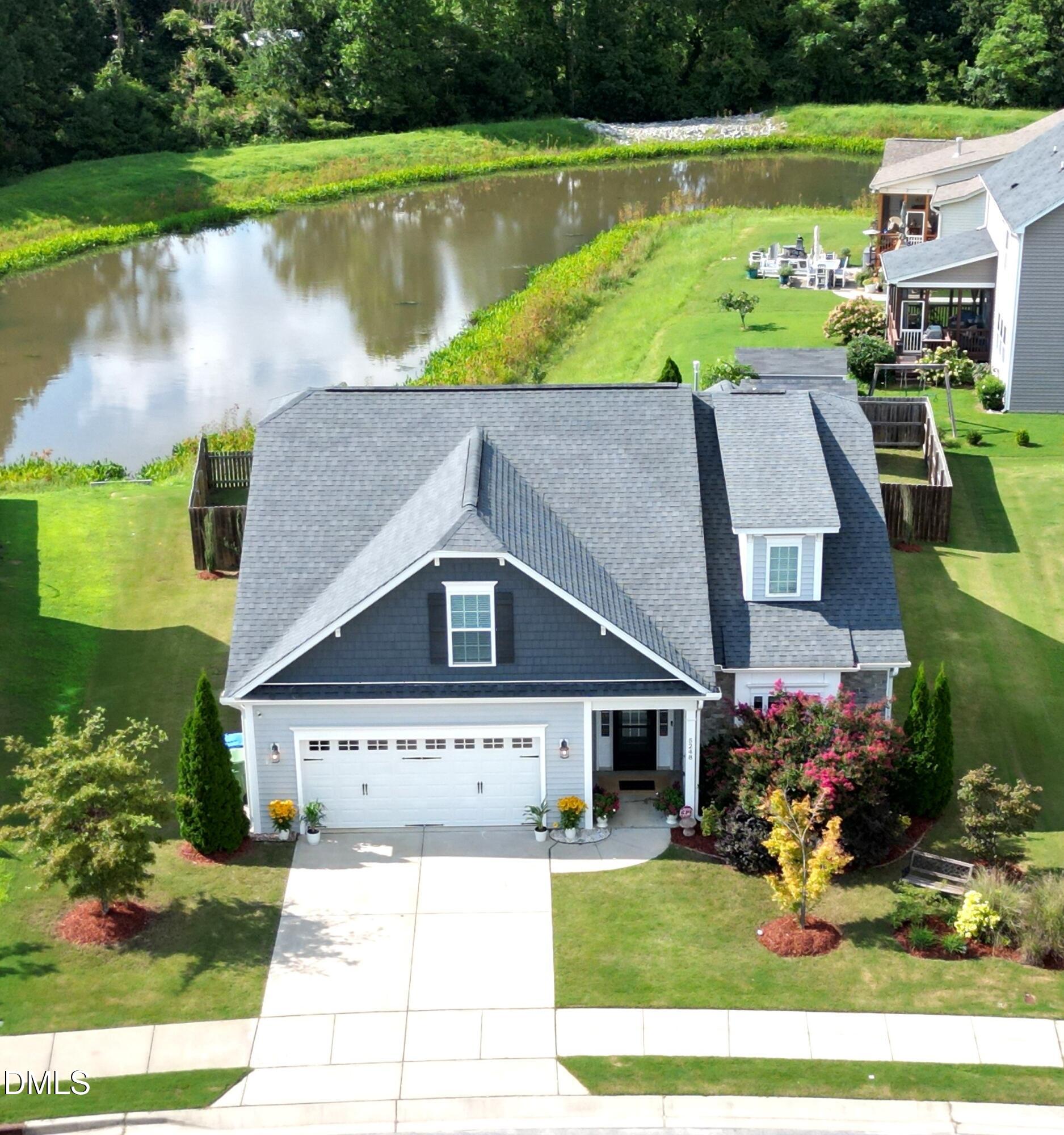 5248 Copain Cove Fuquay-Varina, NC 27526 - Photo 42 of 47 a aerial view of a house with a yard