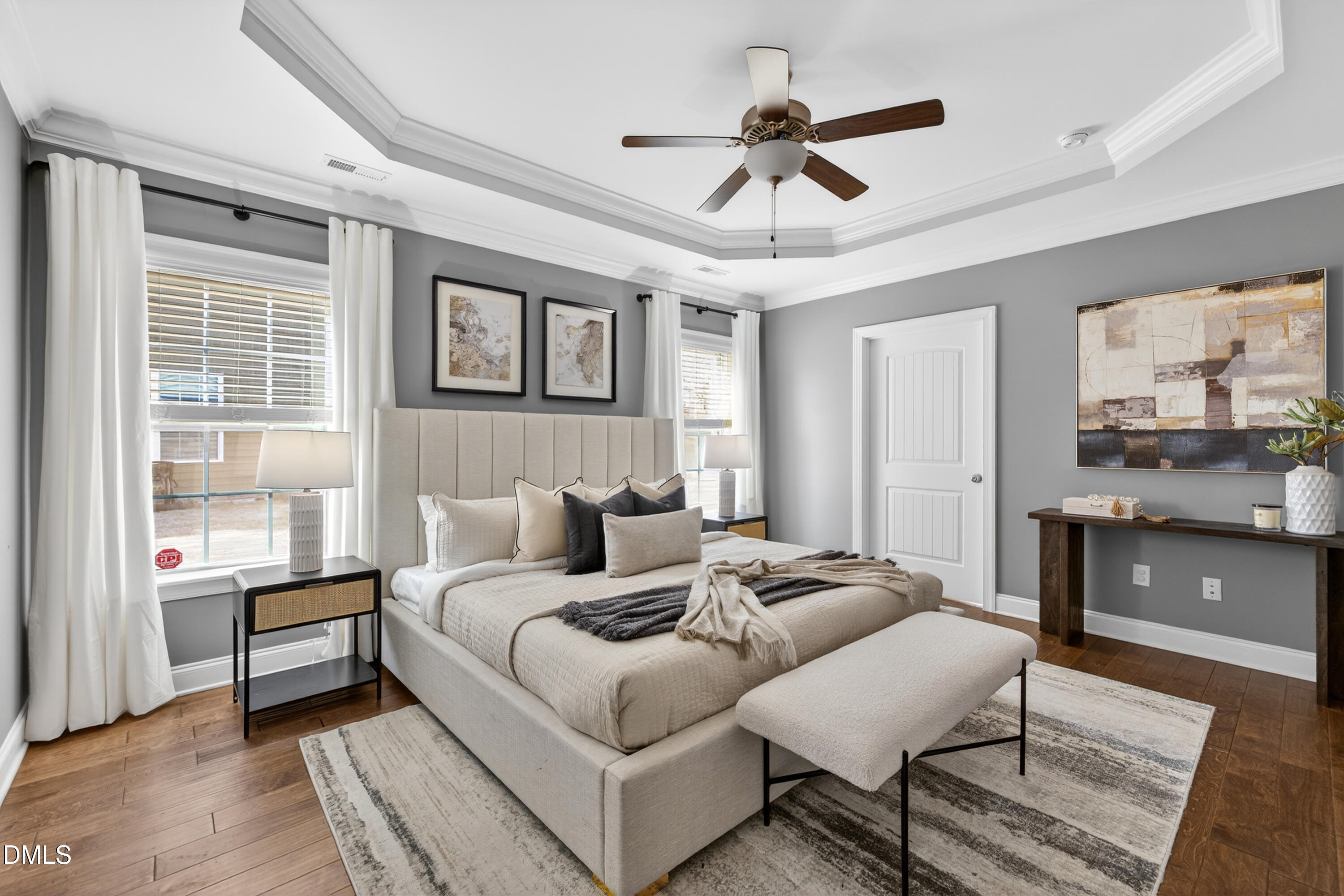 5248 Copain Cove Fuquay-Varina, NC 27526 - Photo 6 of 47 a living room with furniture a ceiling fan and a window