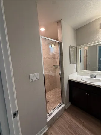 a bathroom with a sink and mirror