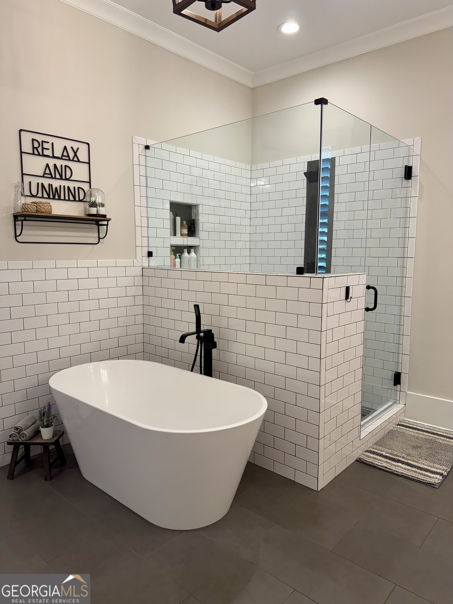 120 Spring Creek Drive Rutledge, GA 30663 - Photo 21 of 38 a bathroom with a bathtub and shower