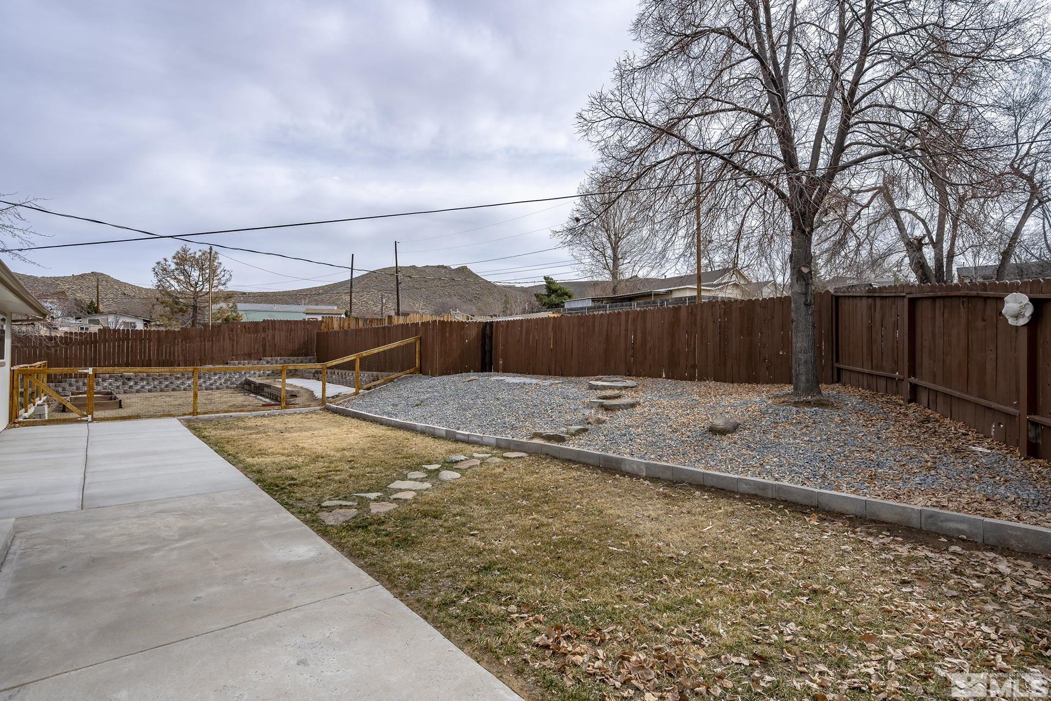 8895 Limnol Street Reno, NV 89506 - Photo 17 of 21 a view of swimming pool with a patio