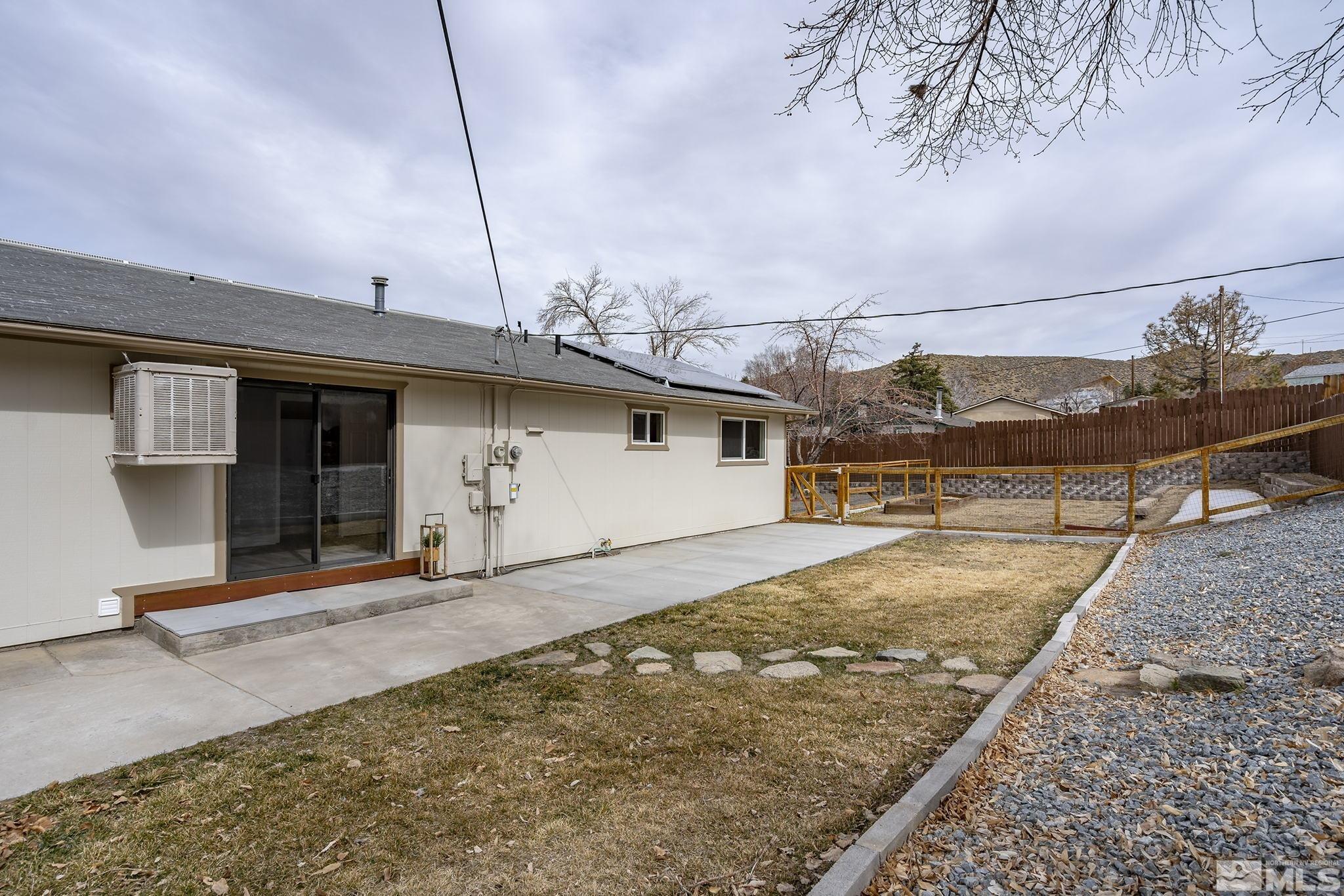 8895 Limnol Street Reno, NV 89506 - Photo 19 of 21 a view of a house with backyard