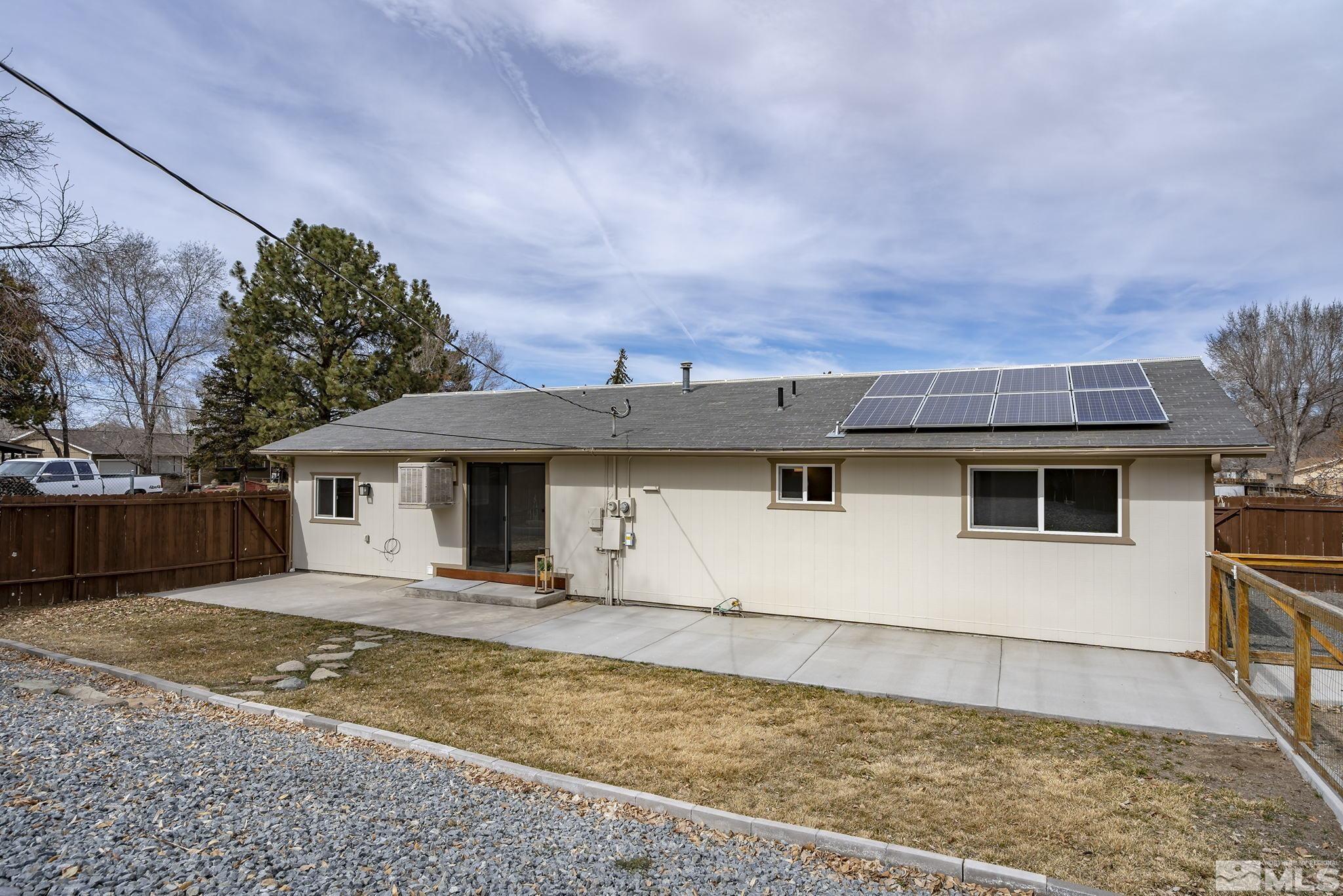 8895 Limnol Street Reno, NV 89506 - Photo 20 of 21 a front view of a house with a yard