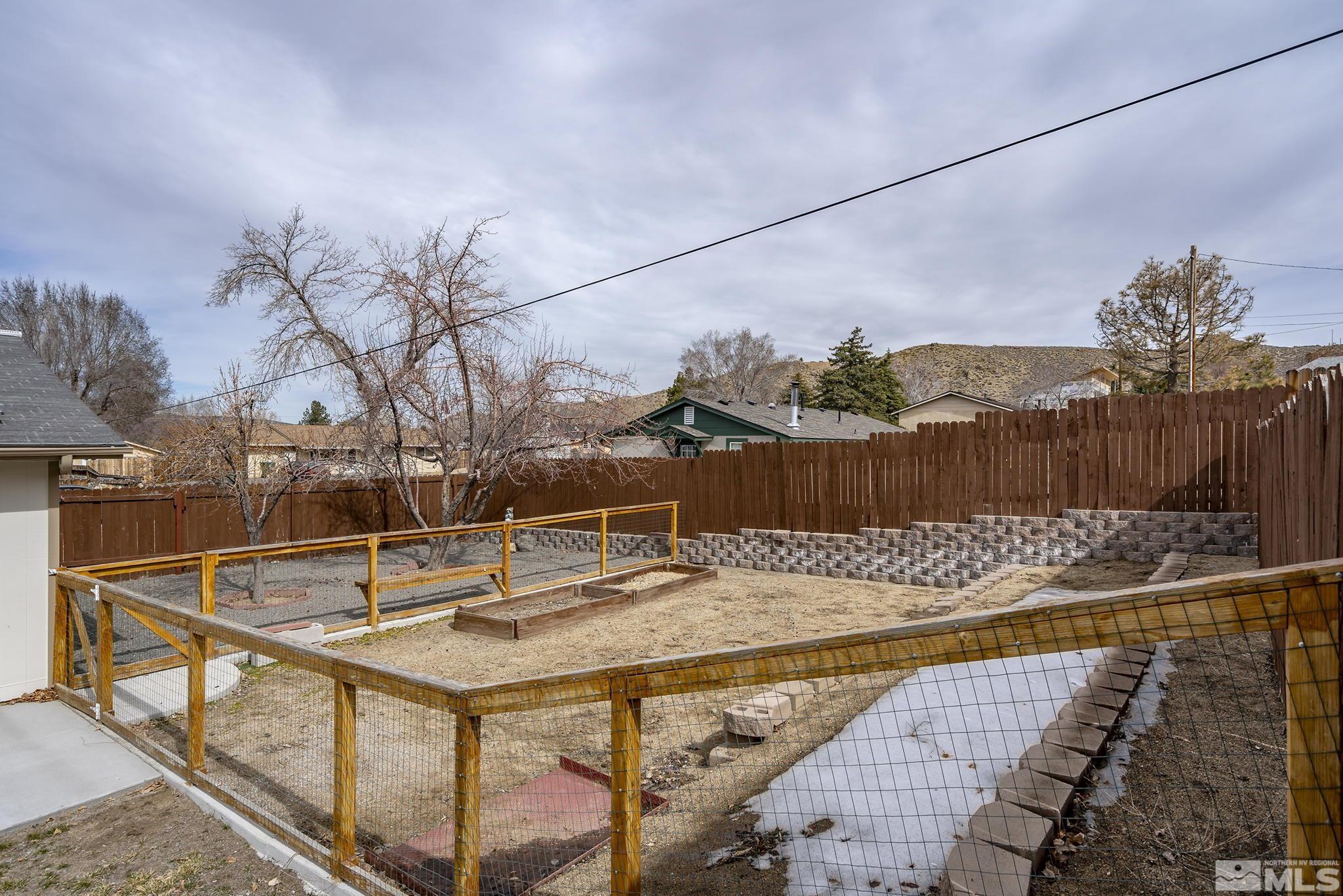8895 Limnol Street Reno, NV 89506 - Photo 21 of 21 a view of swimming pool with a patio and a slide