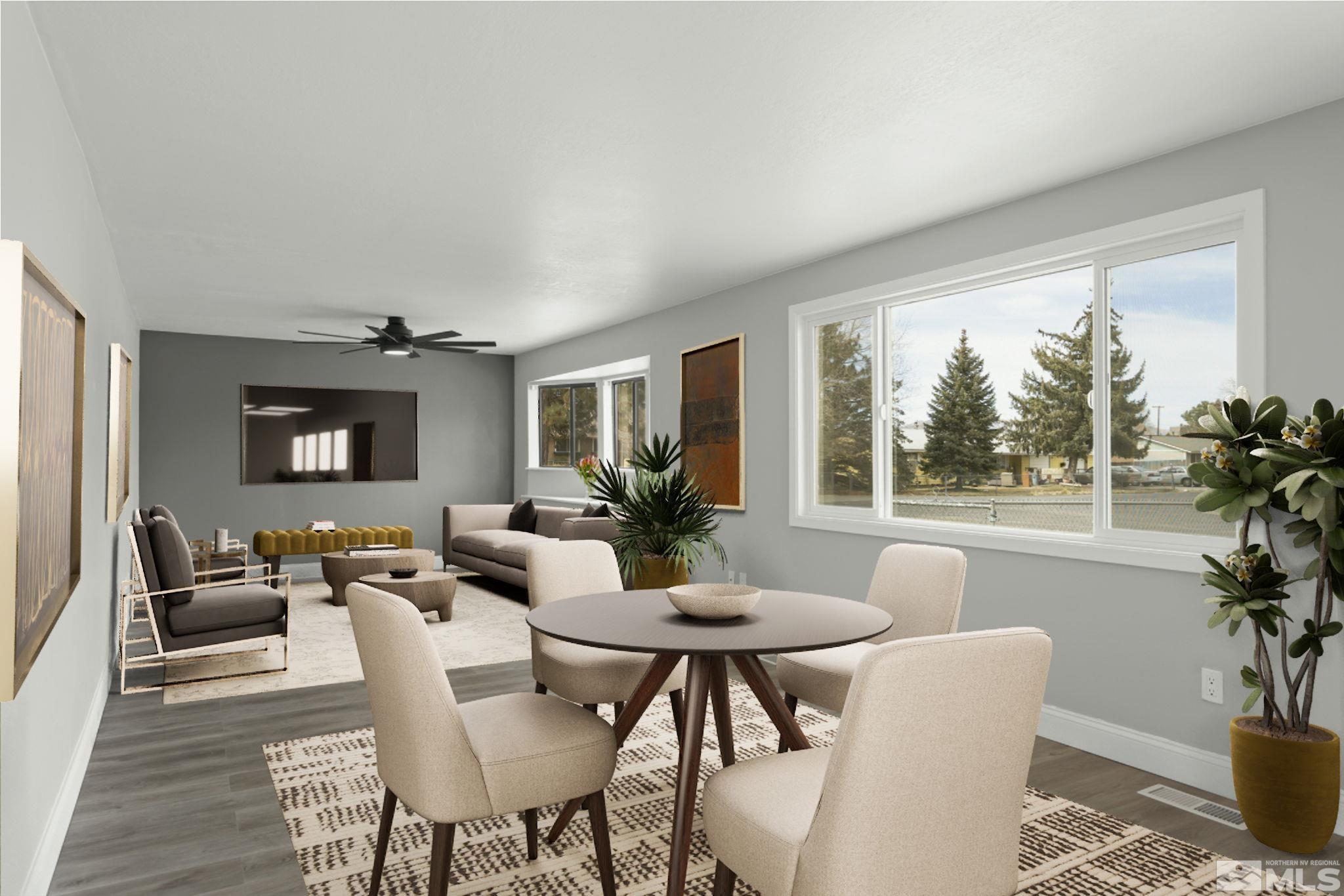 8895 Limnol Street Reno, NV 89506 - Photo 3 of 21 a view of a dining room with furniture window and outside view