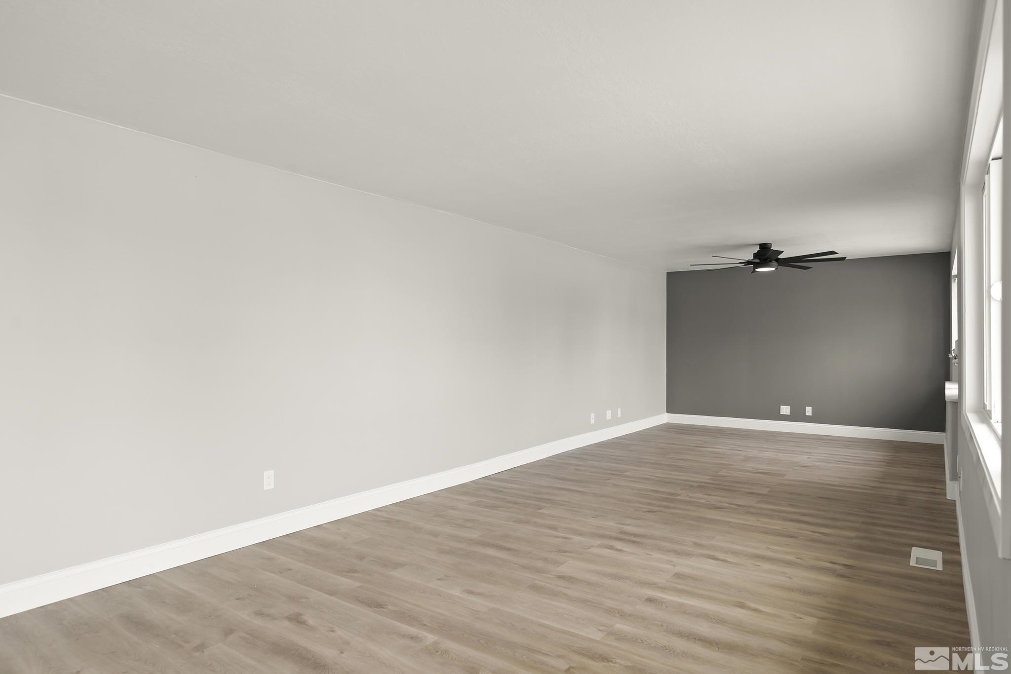 8895 Limnol Street Reno, NV 89506 - Photo 5 of 21 wooden floor in a empty room