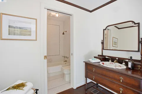 a bedroom with bed and a window