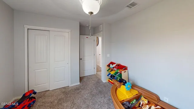 a view of a house with sitting area and furniture