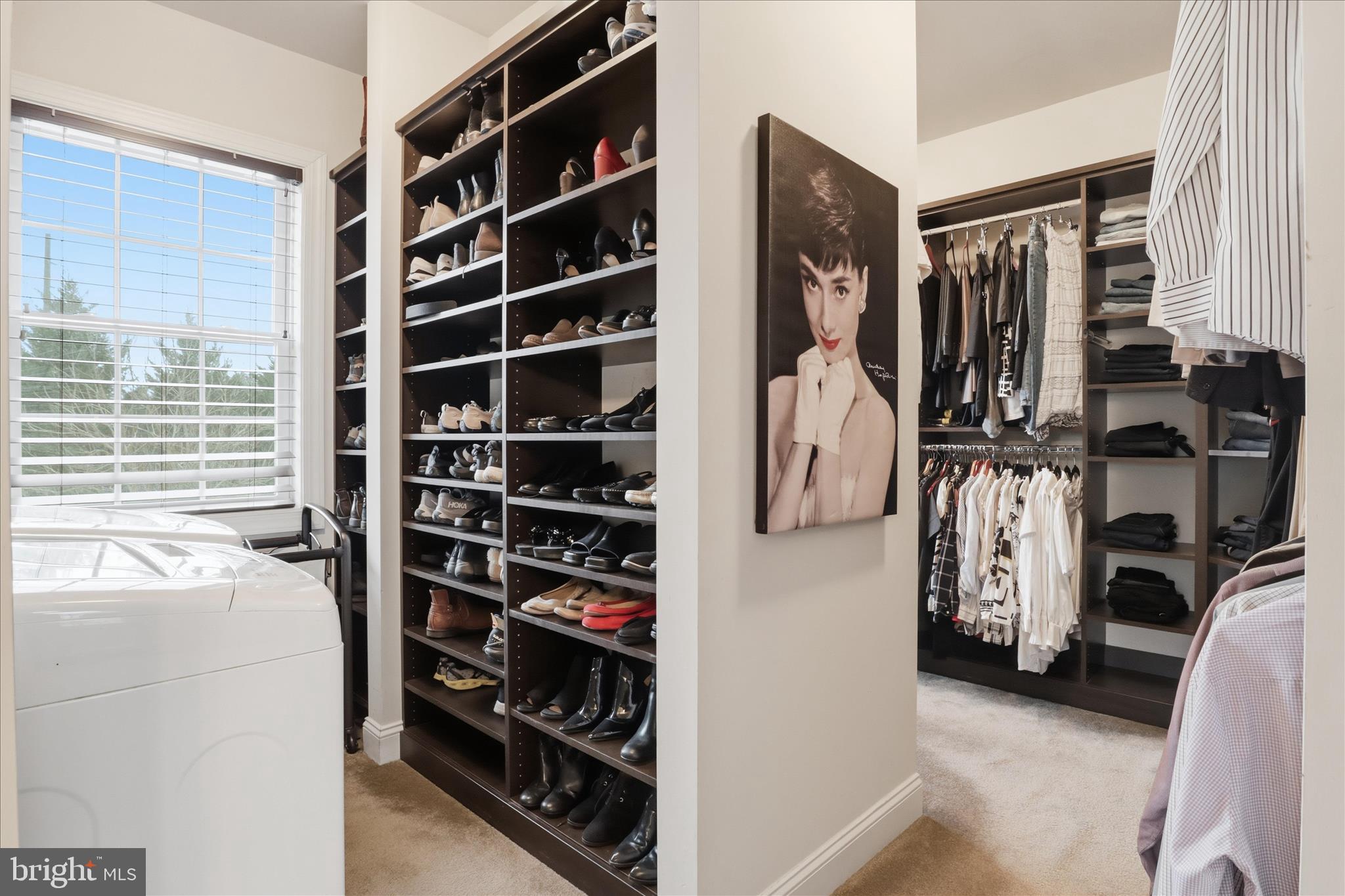 7501 Clifton Road Clifton, VA 20124 - Photo 38 of 93 a view of walk in closet with clothes and shoes