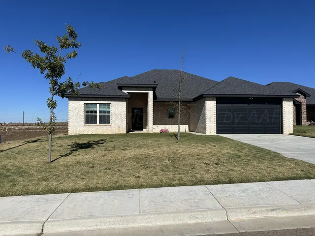 a house with trees in the background
