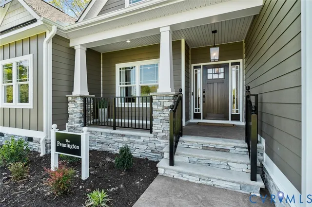 a front view of a house with a porch