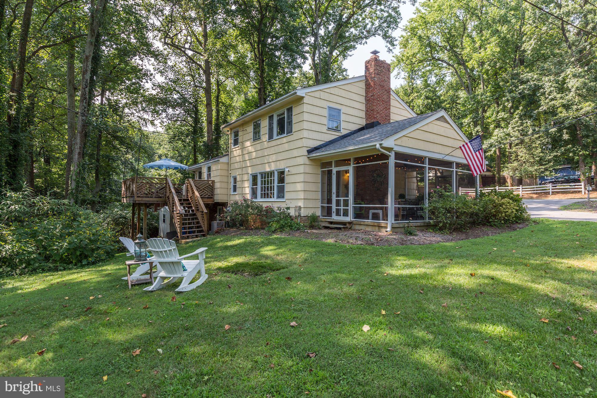 2614 Ogleton Road Annapolis, MD 21403 - Photo 2 of 30 Side yard with view of spacious screened in porch