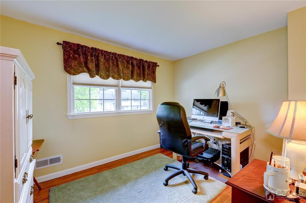 13 June Way Middlesex, NJ 08846 - Photo 16 of 22 a view of a workspace with furniture and a window