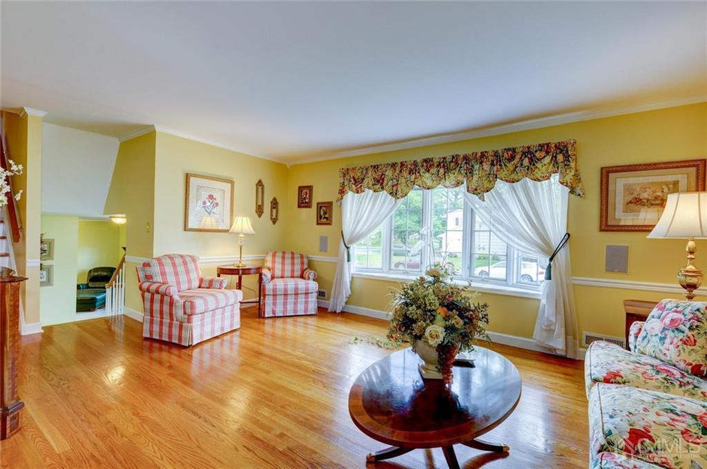 13 June Way Middlesex, NJ 08846 - Photo 5 of 22 a living room with furniture and a large window