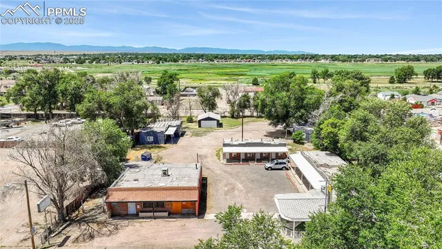 a view of a lake with a yard