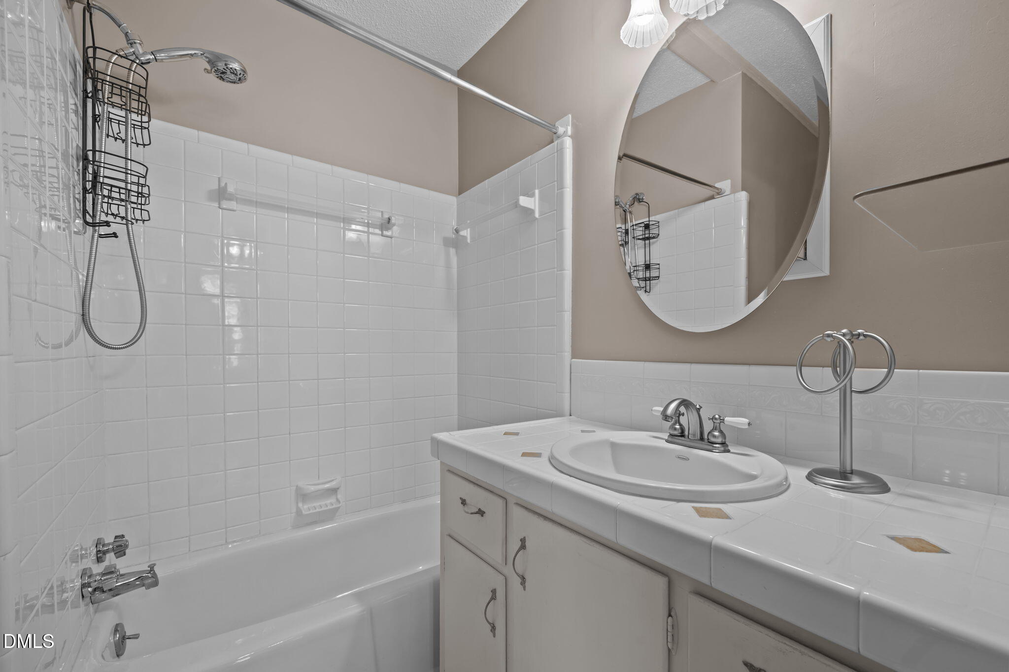 7111 Highway 401 Bunnlevel, NC 28323 - Photo 18 of 39 a bathroom with a granite countertop sink a mirror a shower and a bathtub