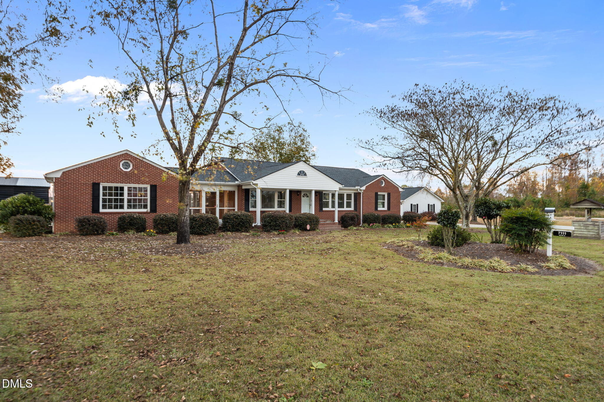 7111 Highway 401 Bunnlevel, NC 28323 - Photo 2 of 39 a front view of a house with a yard