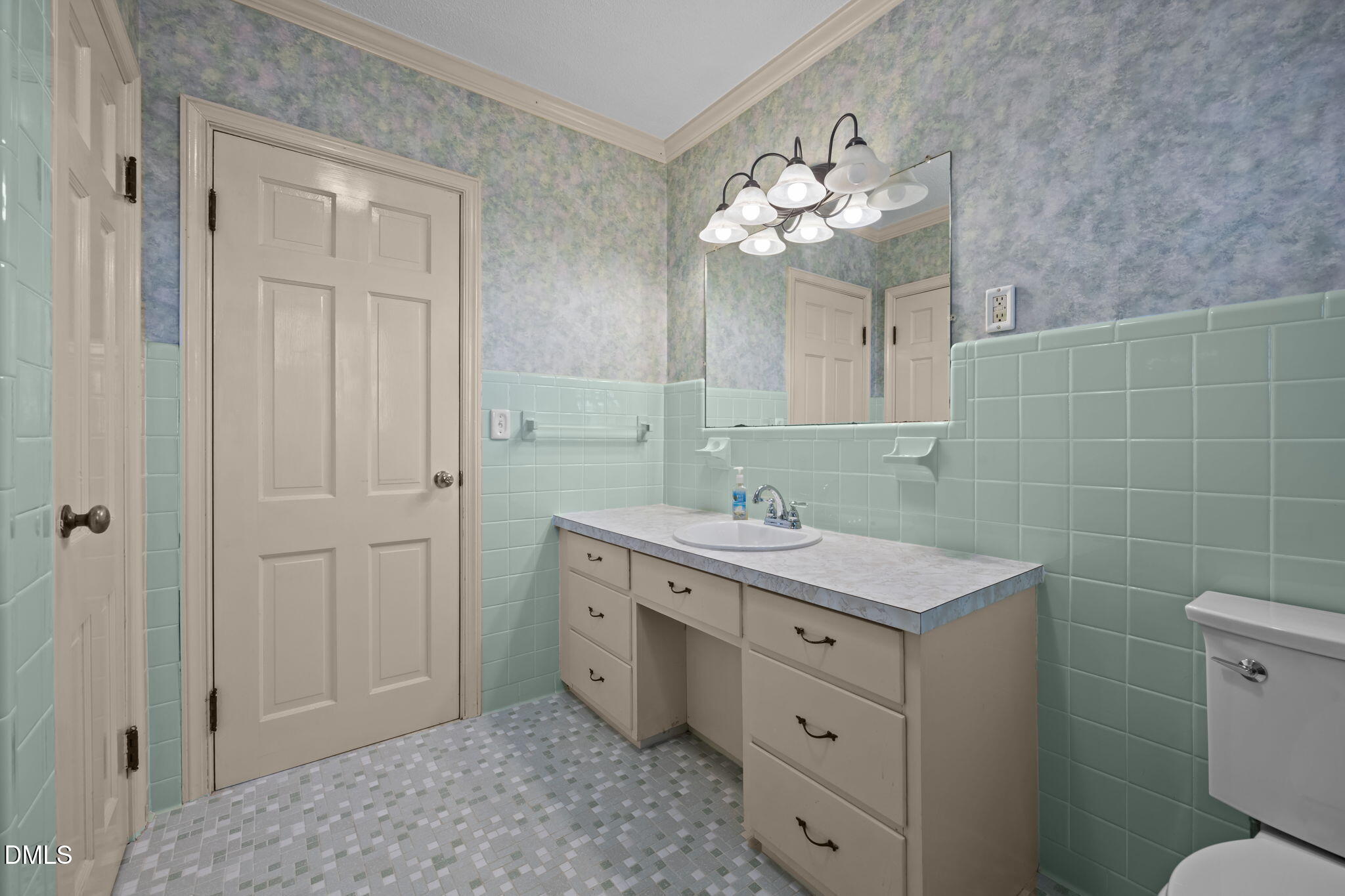 7111 Highway 401 Bunnlevel, NC 28323 - Photo 22 of 39 a spacious bathroom with a sink vanity and a mirror