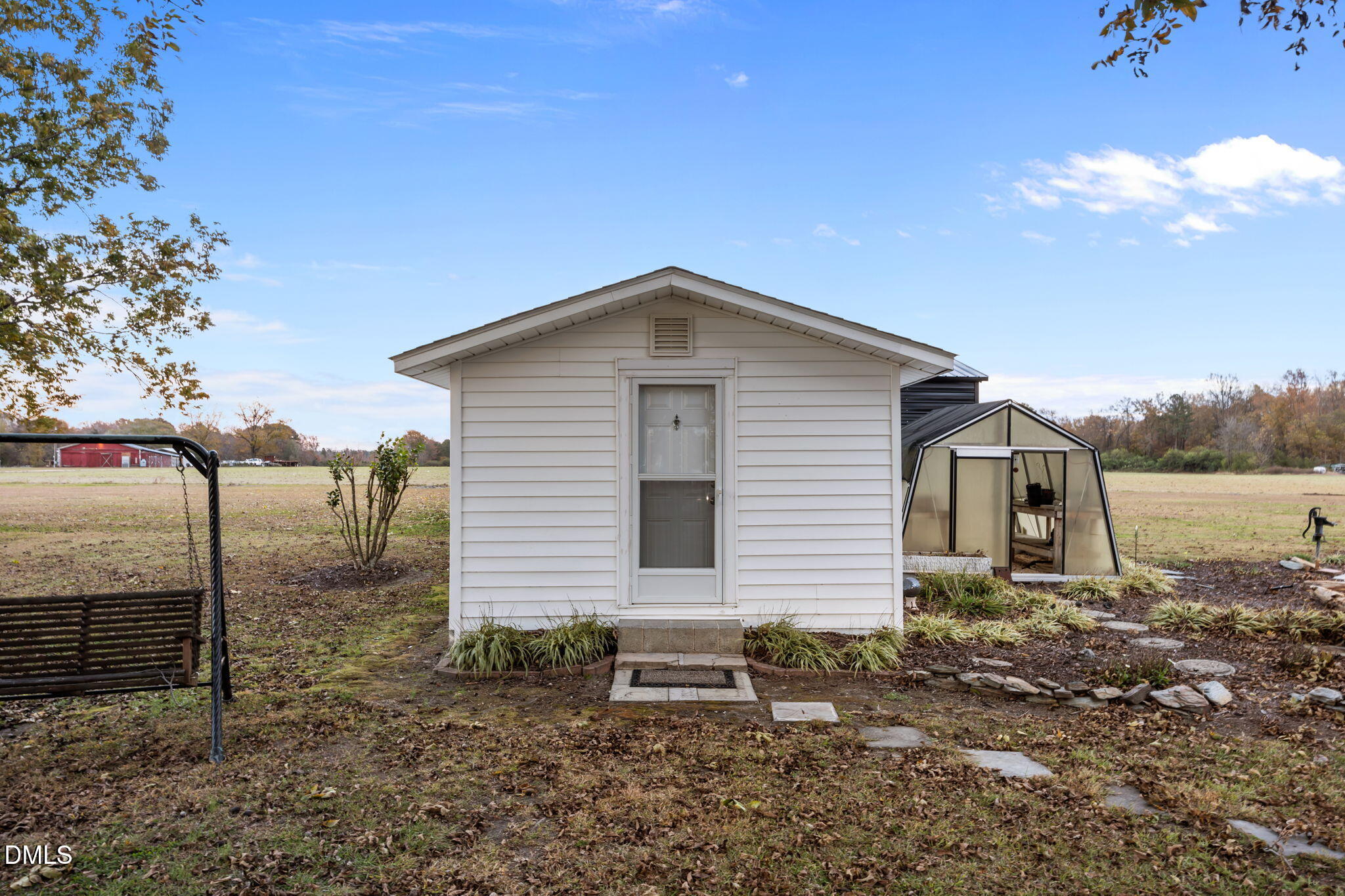 7111 Highway 401 Bunnlevel, NC 28323 - Photo 28 of 39 a front view of a house with garden