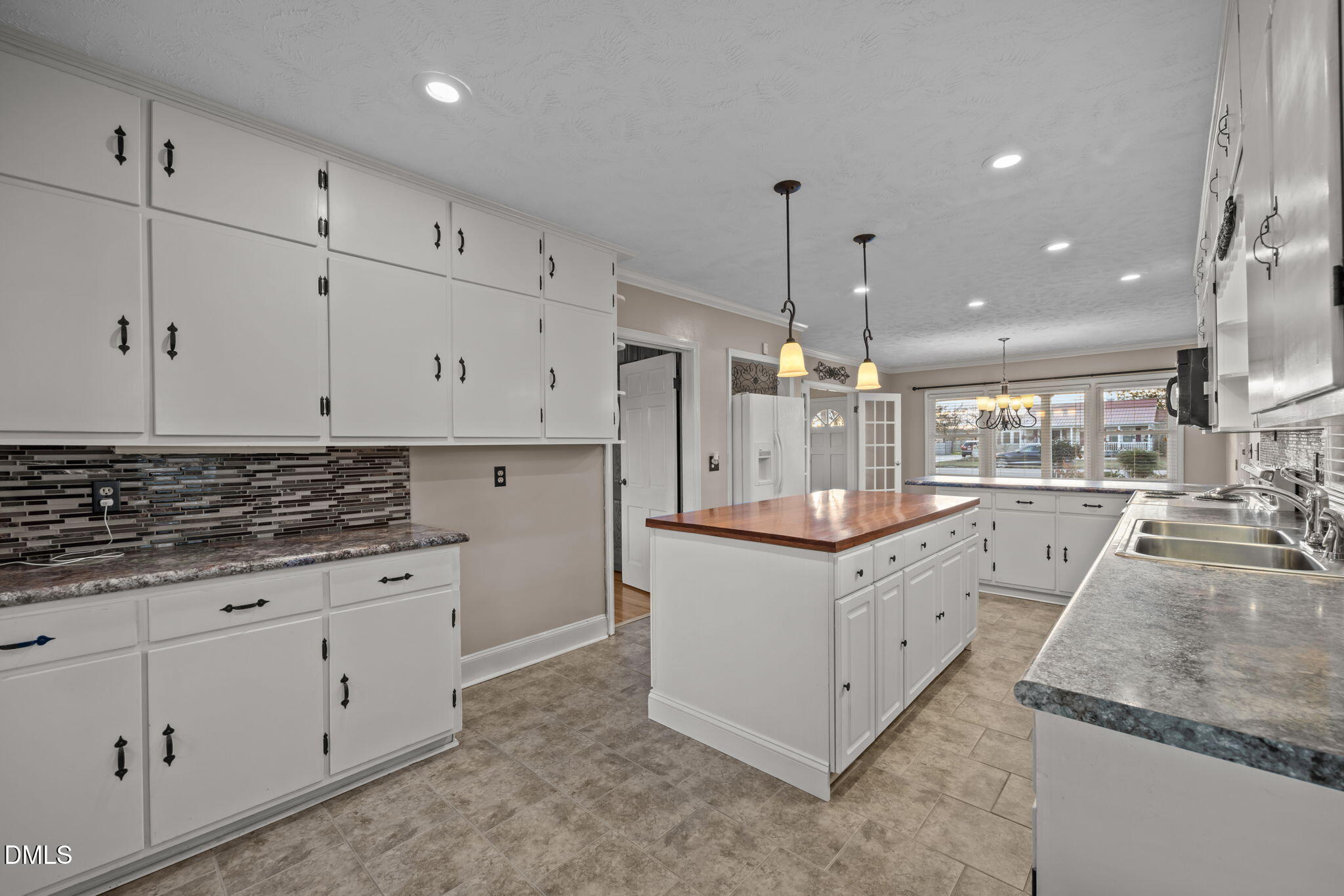 7111 Highway 401 Bunnlevel, NC 28323 - Photo 5 of 39 a kitchen with white cabinets