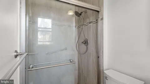 a bathroom that has a shower sink