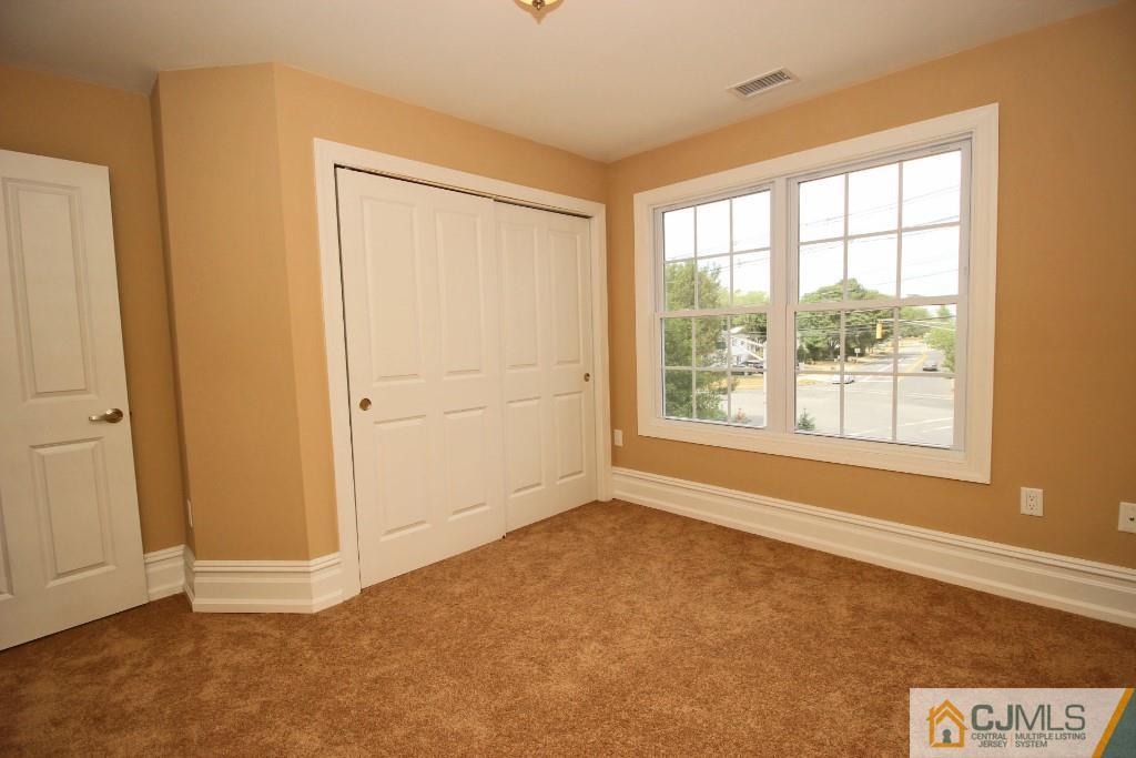 1035 New Durham Road Edison, NJ 08817 - Photo 23 of 24 a view of an empty room with a window