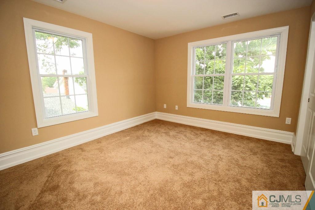 1035 New Durham Road Edison, NJ 08817 - Photo 24 of 24 an empty room with a window