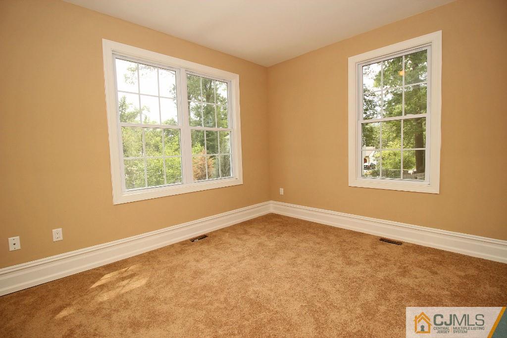 1035 New Durham Road Edison, NJ 08817 - Photo 4 of 24 an empty room with a window