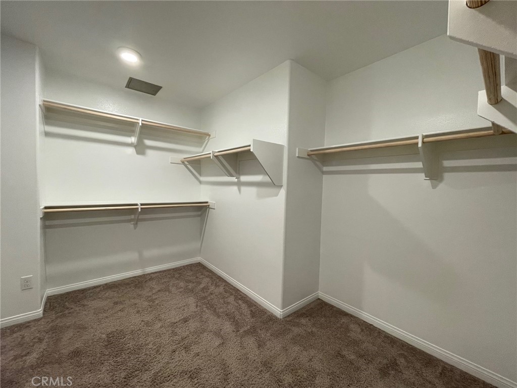 164 Spectacle Irvine, CA 92618 - Photo 12 of 21 a view of an empty walk in closet