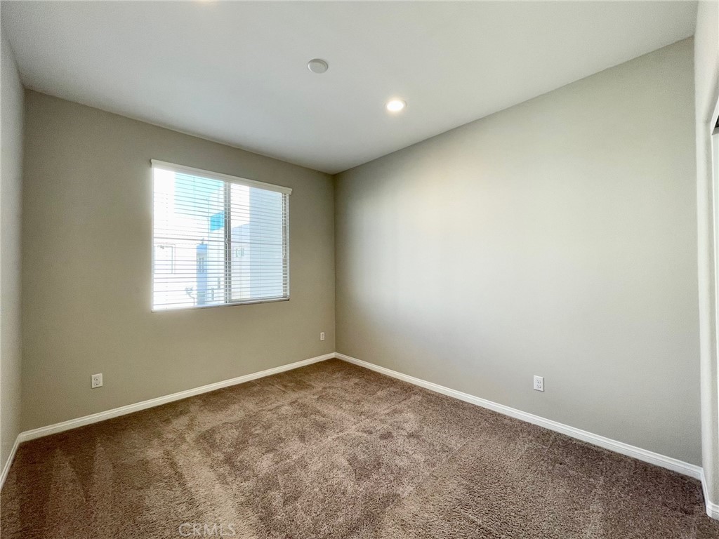 164 Spectacle Irvine, CA 92618 - Photo 14 of 21 an empty room with a window