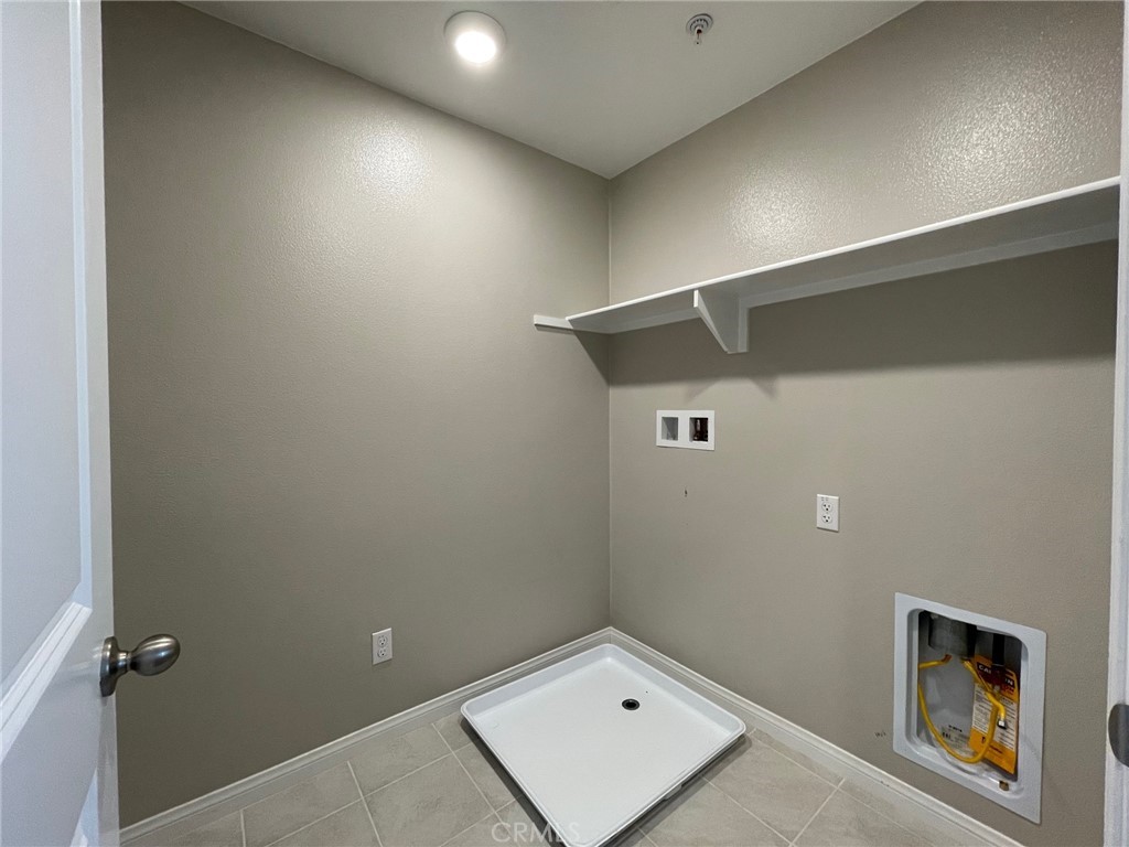 164 Spectacle Irvine, CA 92618 - Photo 16 of 21 a bathroom with a sink and vanity