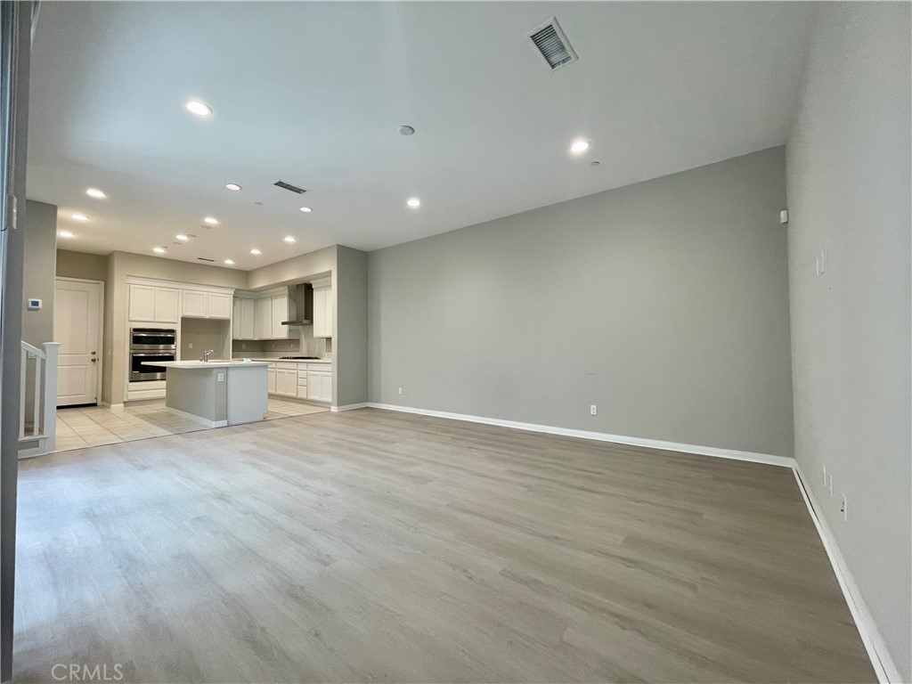 164 Spectacle Irvine, CA 92618 - Photo 3 of 21 a view of kitchen with wooden floor