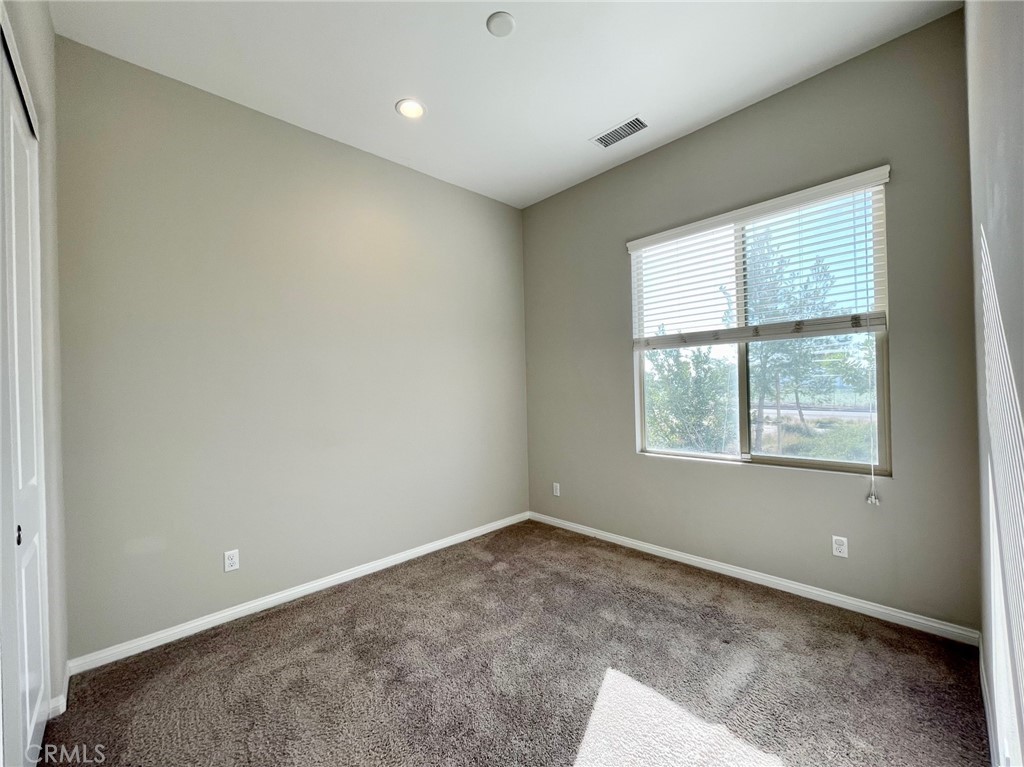 164 Spectacle Irvine, CA 92618 - Photo 6 of 21 an empty room with windows