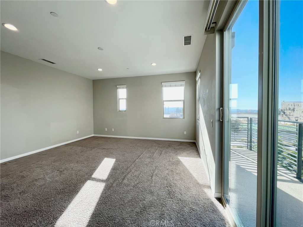 164 Spectacle Irvine, CA 92618 - Photo 9 of 21 a view of a big room with windows and entryway
