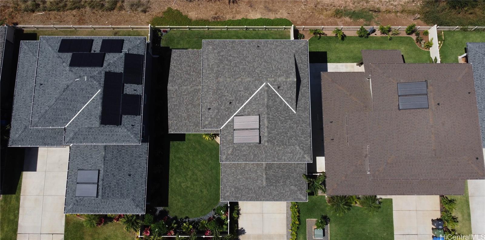 91-1077 Hokua Street Ewa Beach, HI 96706 - Photo 24 of 25 an aerial view of a house with a yard
