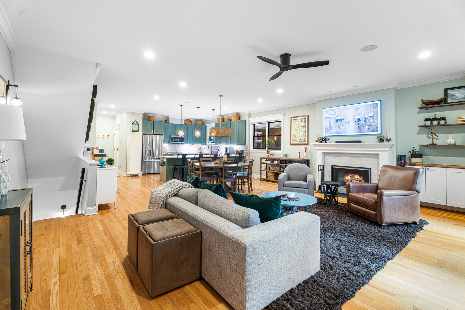 Undisclosed Address Chicago, IL 60613 - Photo 17 of 68 a living room with furniture fireplace and a chandelier